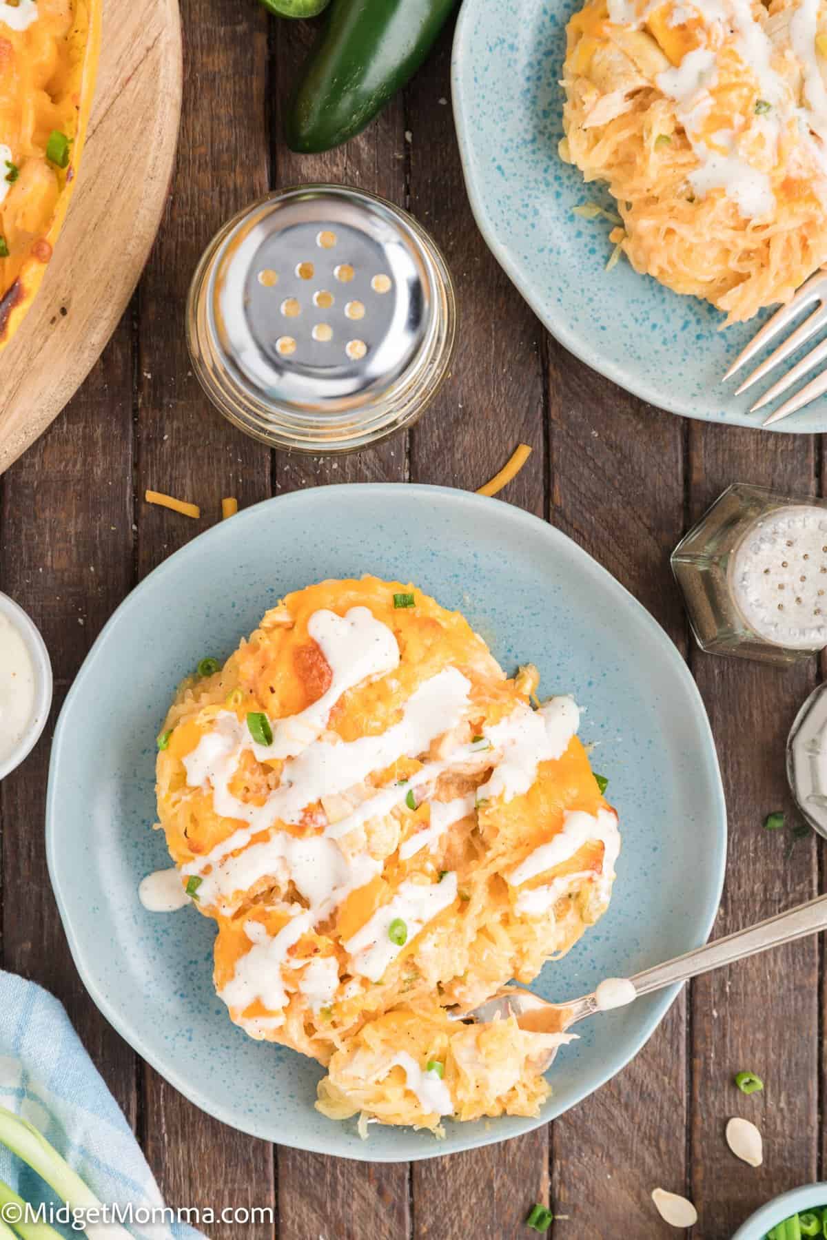 overhead photo of buffalo chicken spaghetti squash on a plate