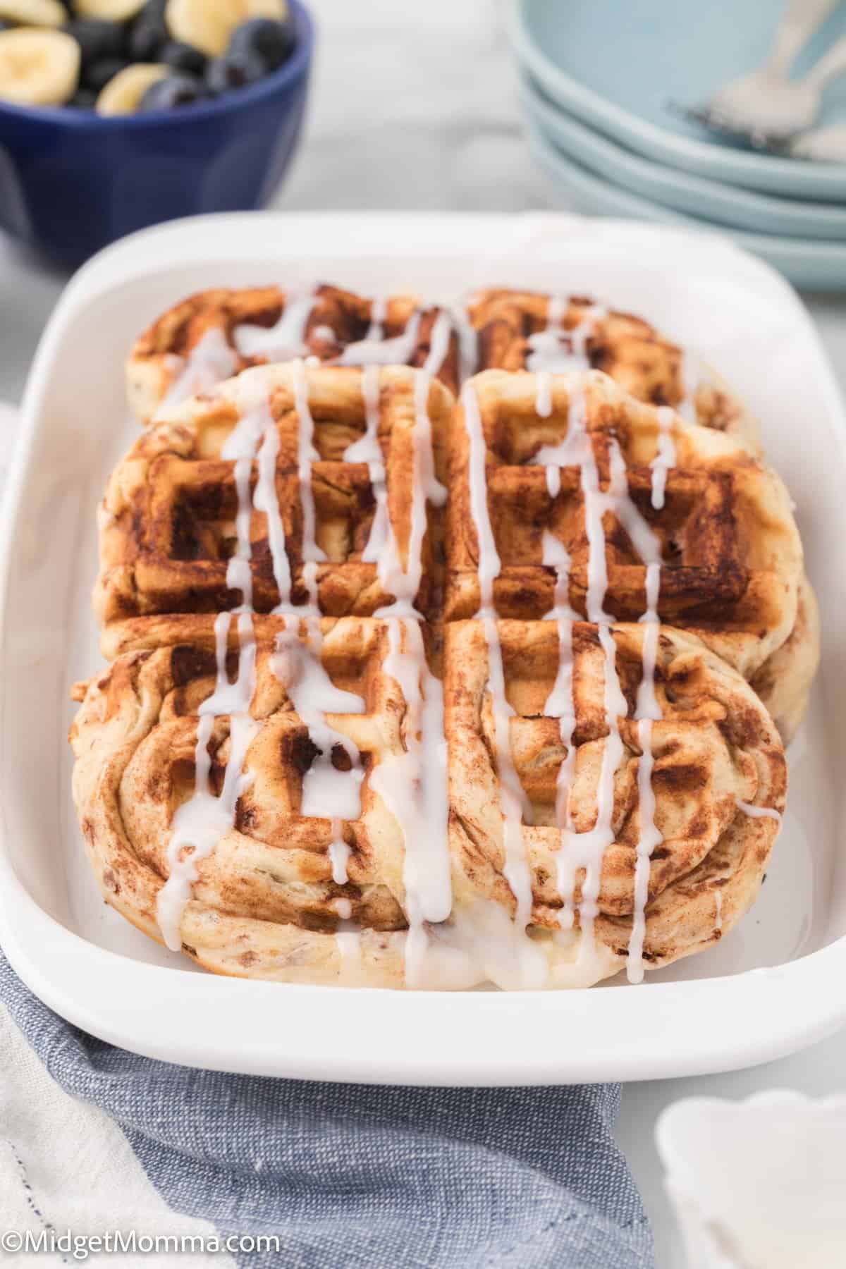 Freshly made Cinnamon roll waffles on a plate