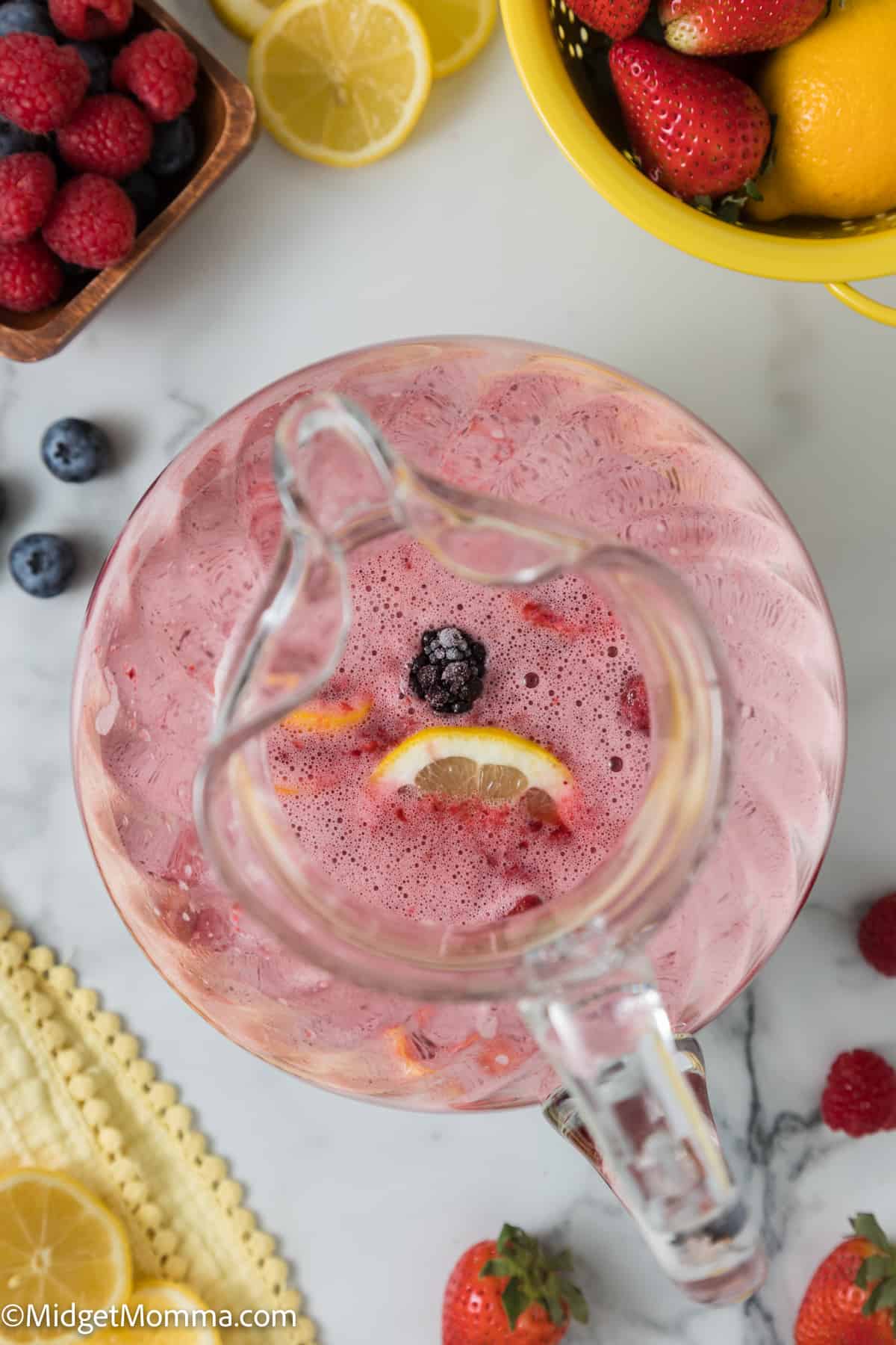 overhead photo of Refreshing Berry Lemonade Made with Strawberries, Blueberries & Blackberries