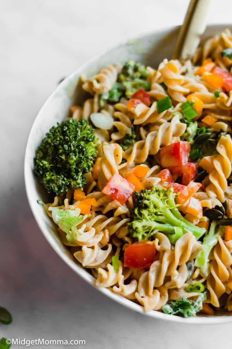 Close up photo of Tahini Pasta Salad in a bowl.