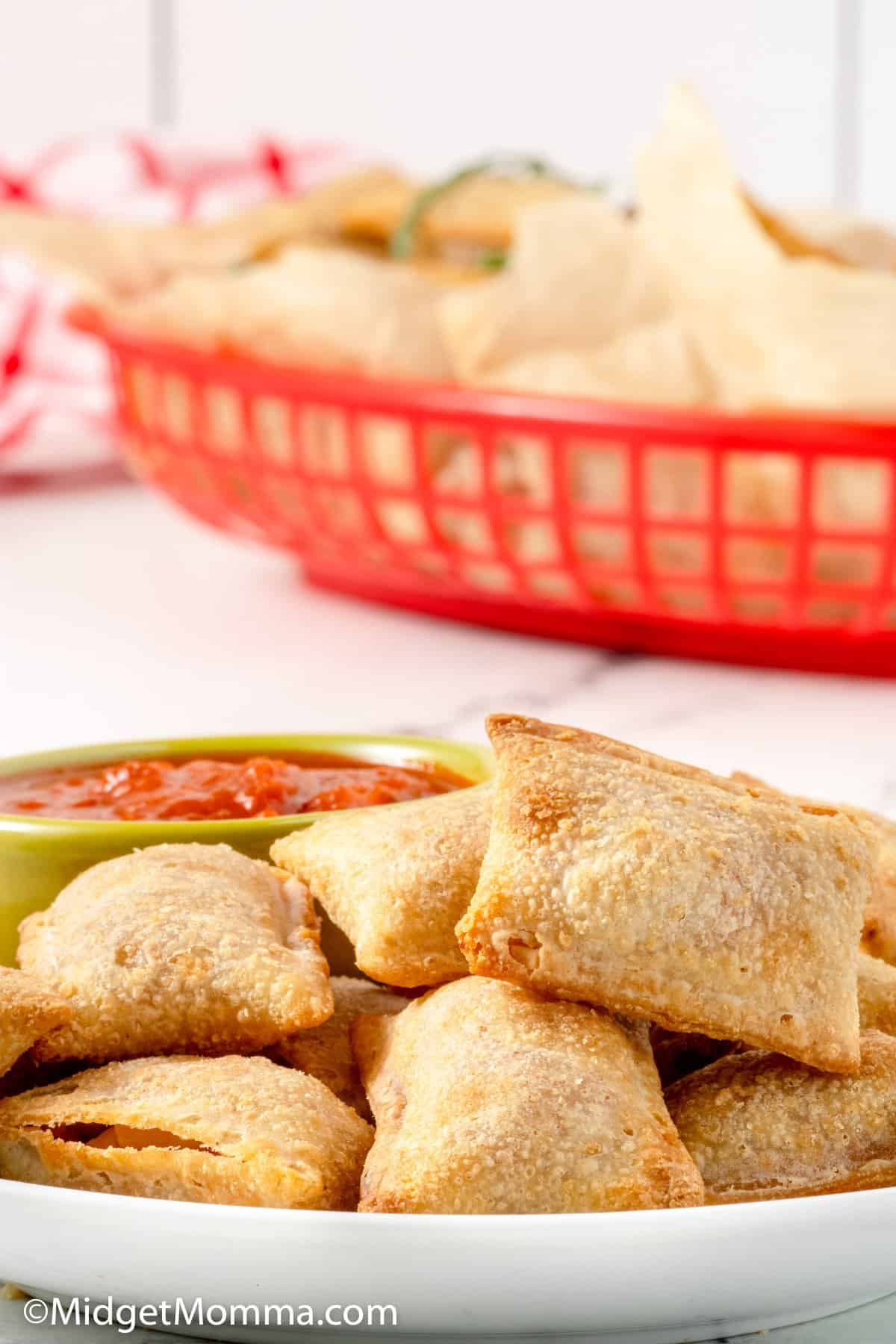 pizza rolls cooked in the air fryer on a plate