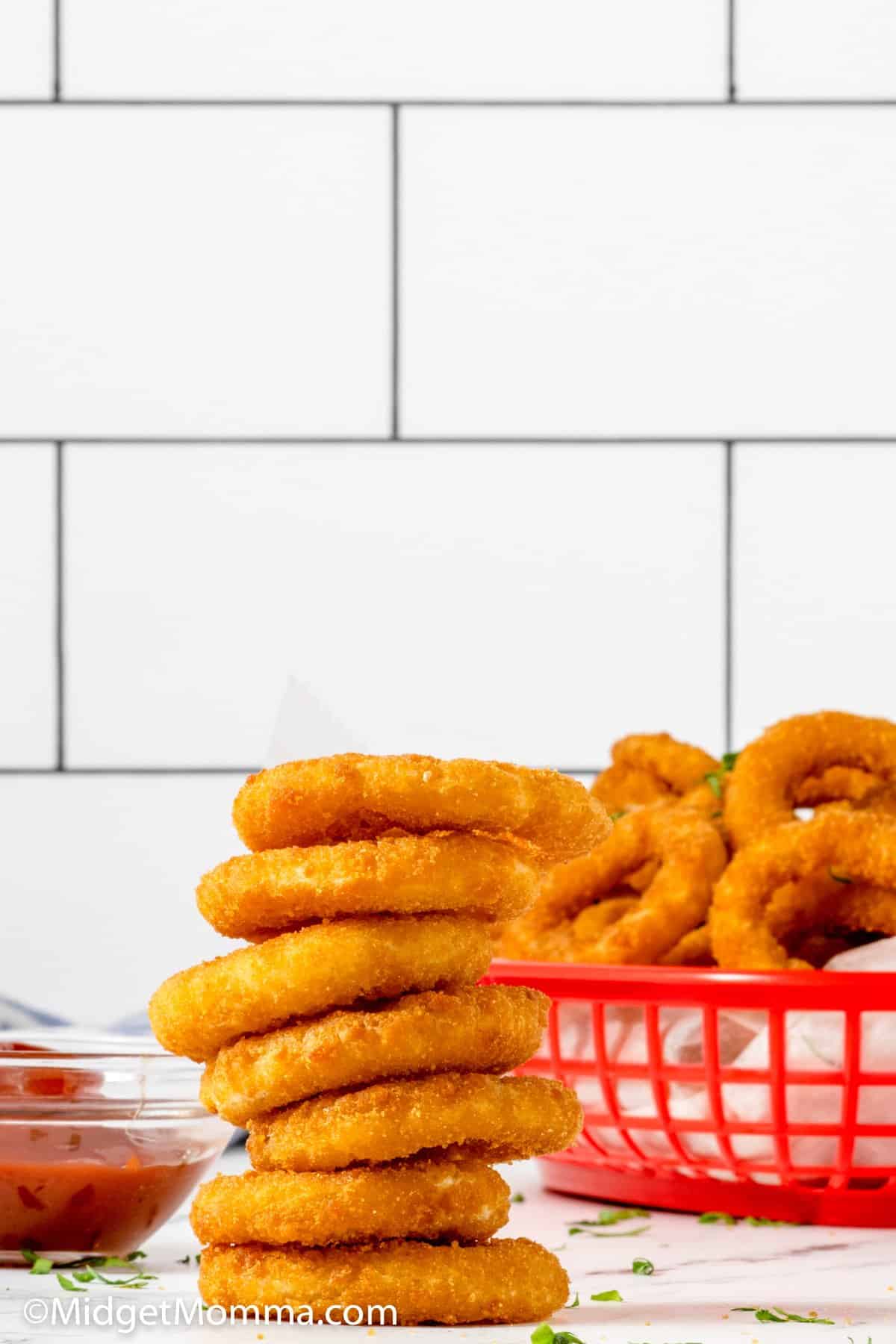 stack of onion rings  after being cooked in the air fryer