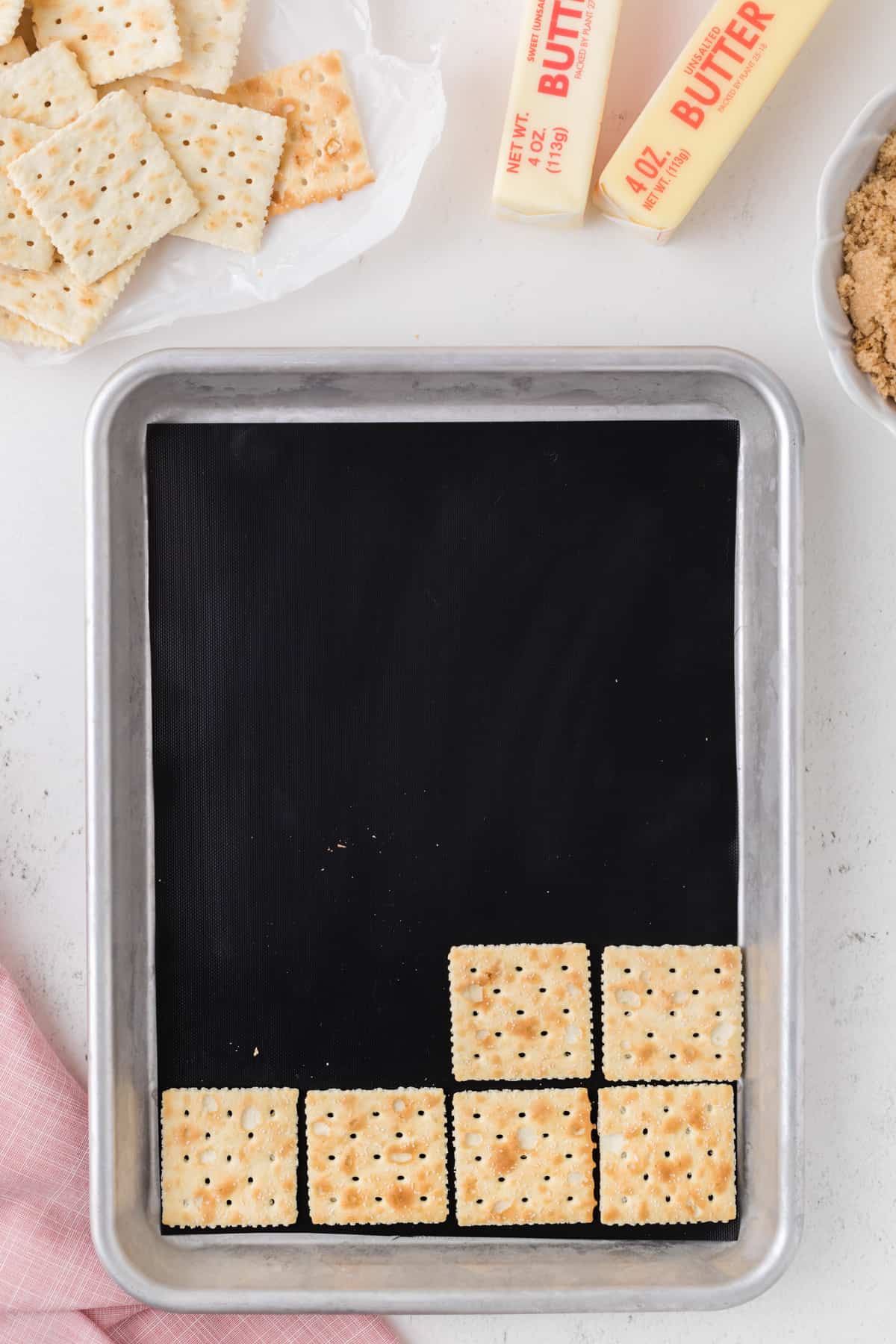 A baking sheet with crackers
