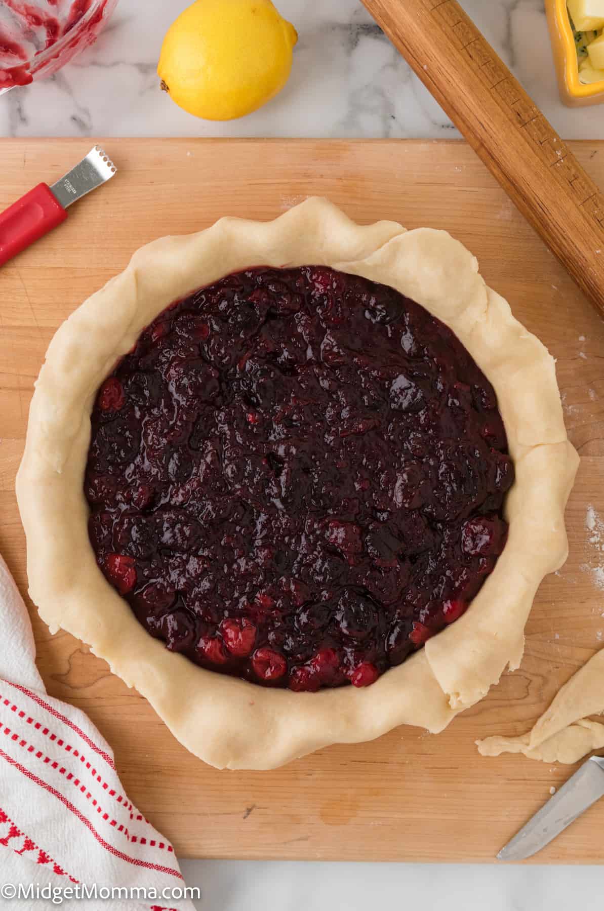 cherry pie filling in an unbaked pie crust