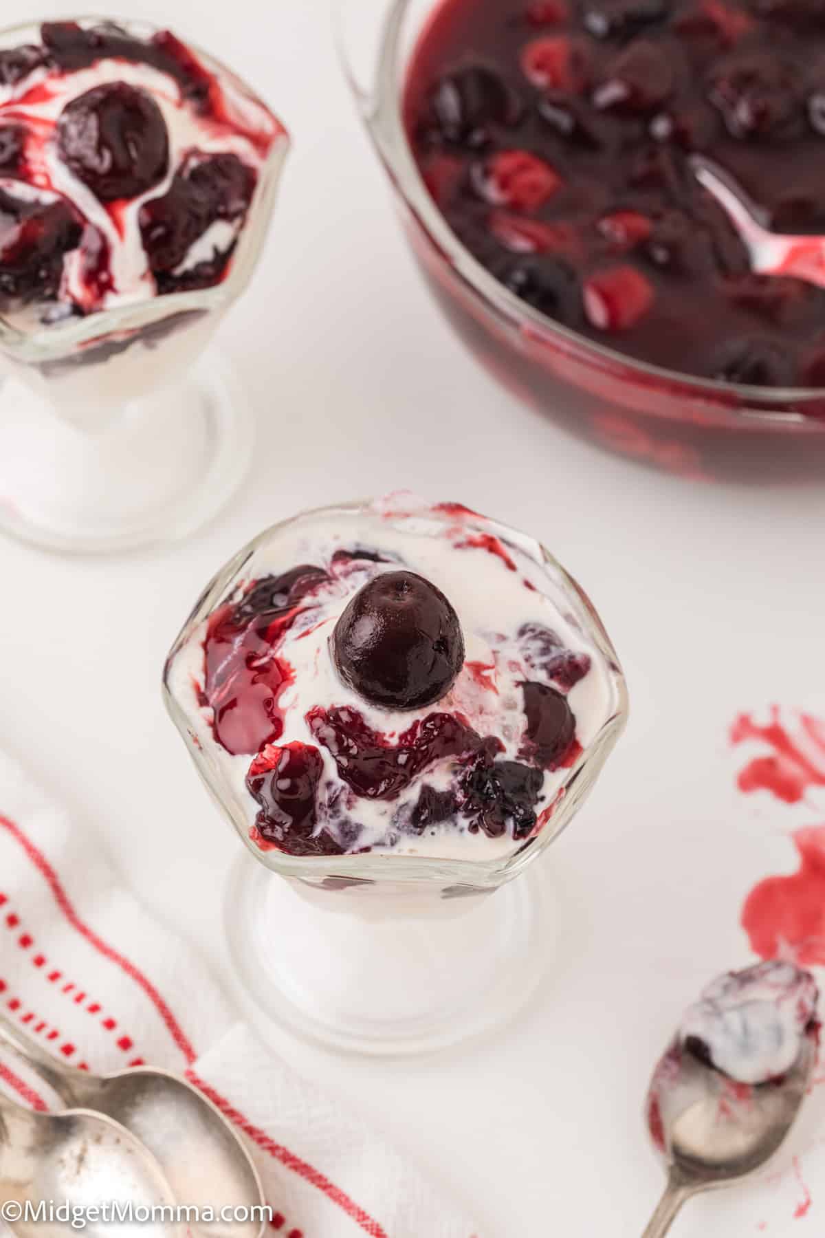 Homemade Cherry pie filling Recipe on top of a bowl of ice cream