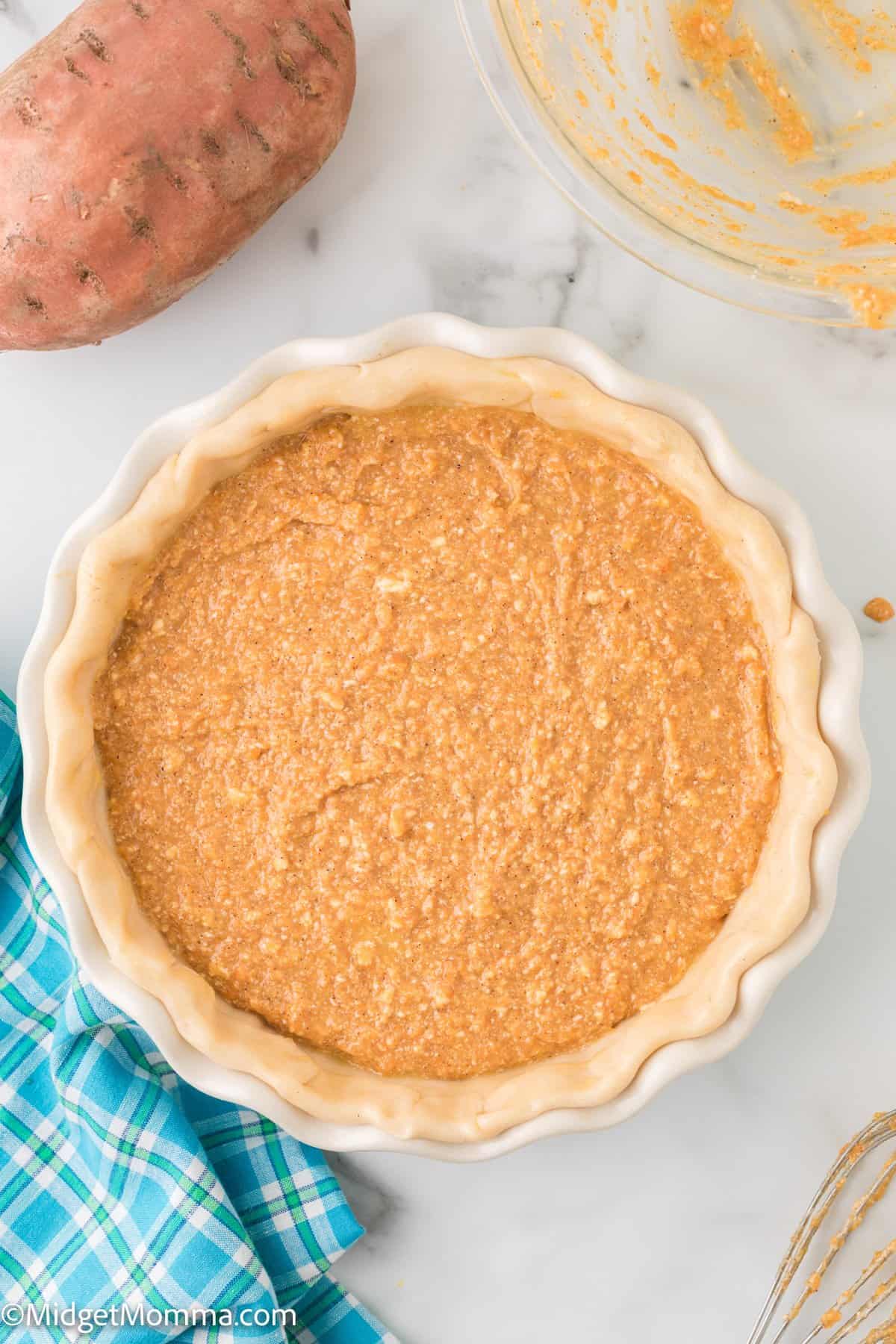 sweet potato pie from scratch ready to go in the oven