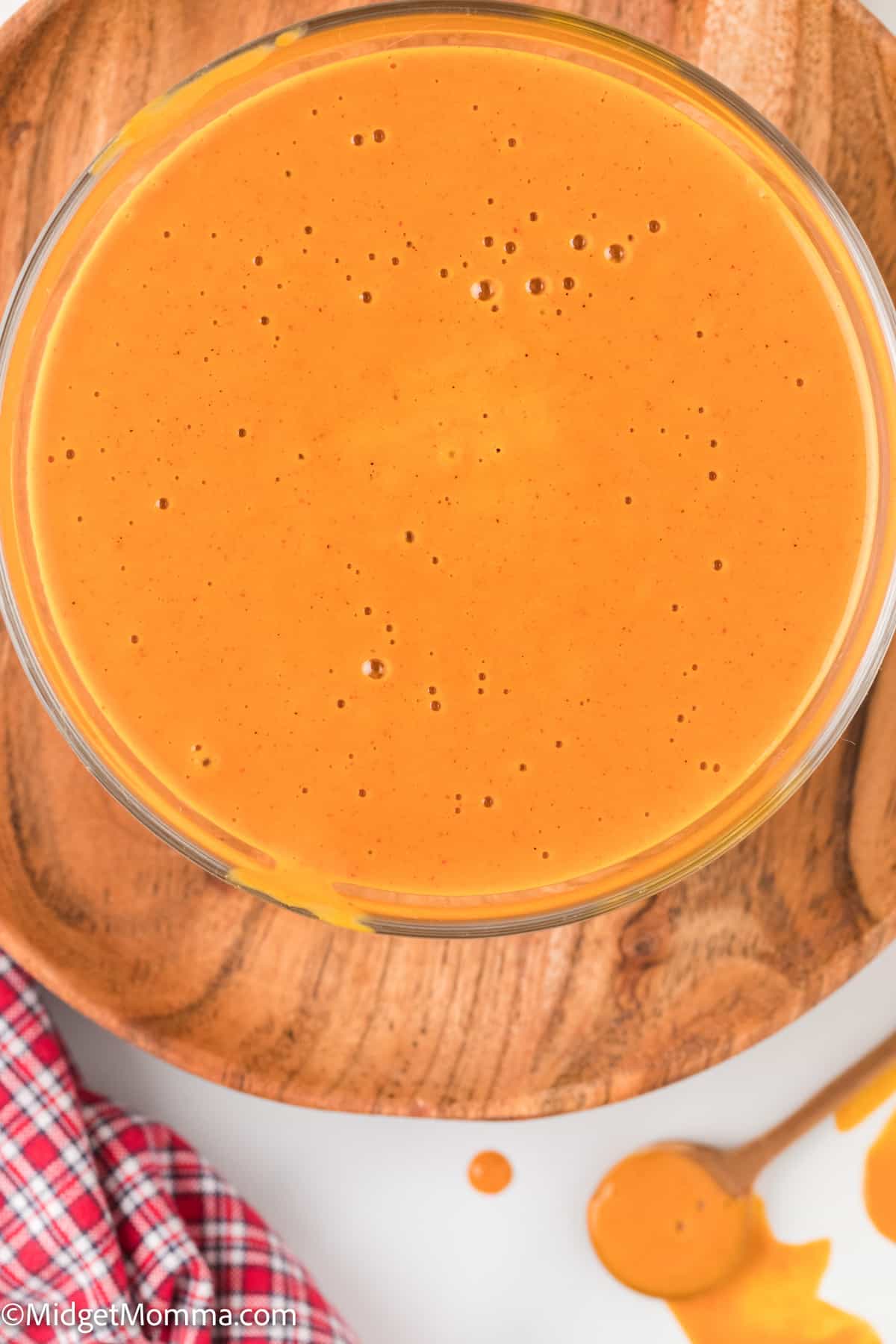 over head photo of homemade buffalo sauce recipe in a bowl