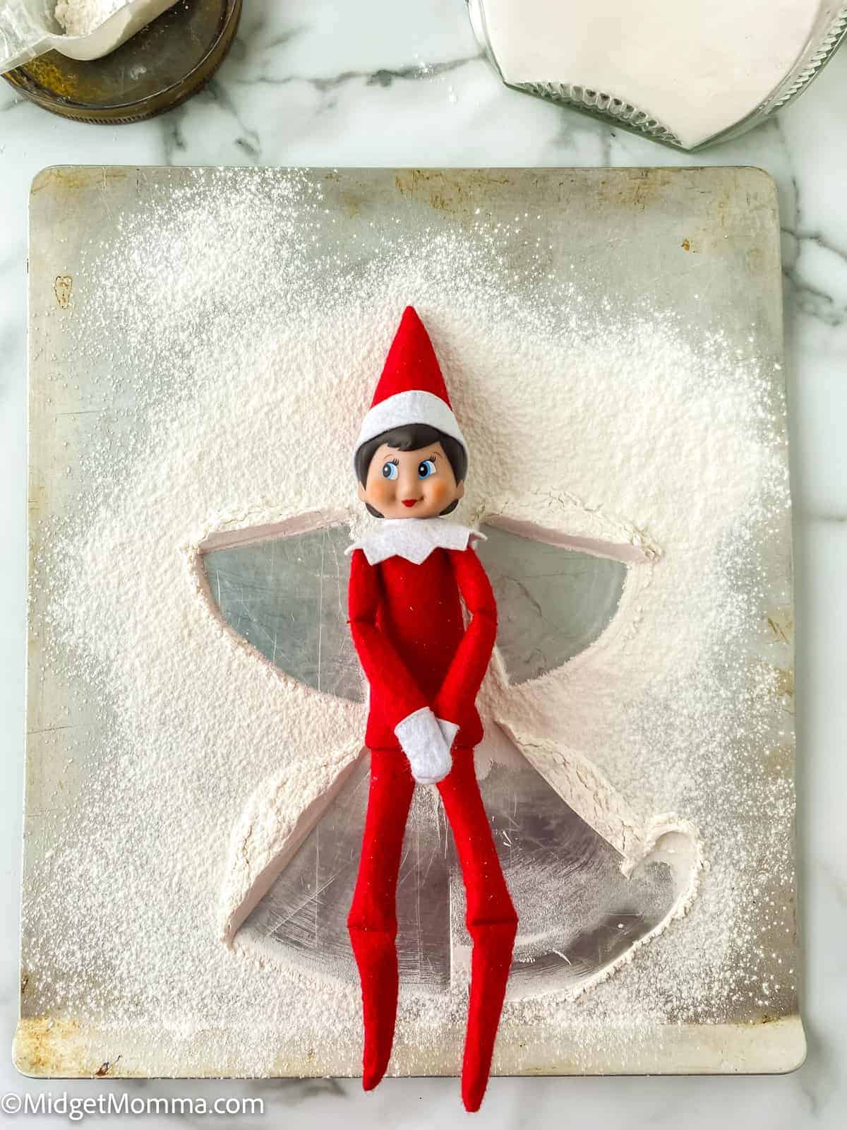 elf snow angel with flour