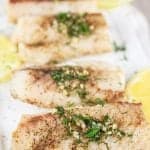 close up photo over air fryer cod fish on a serving dish