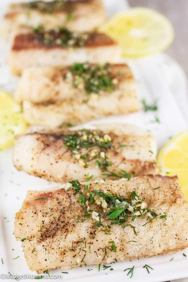 close up photo over air fryer cod fish on a serving dish