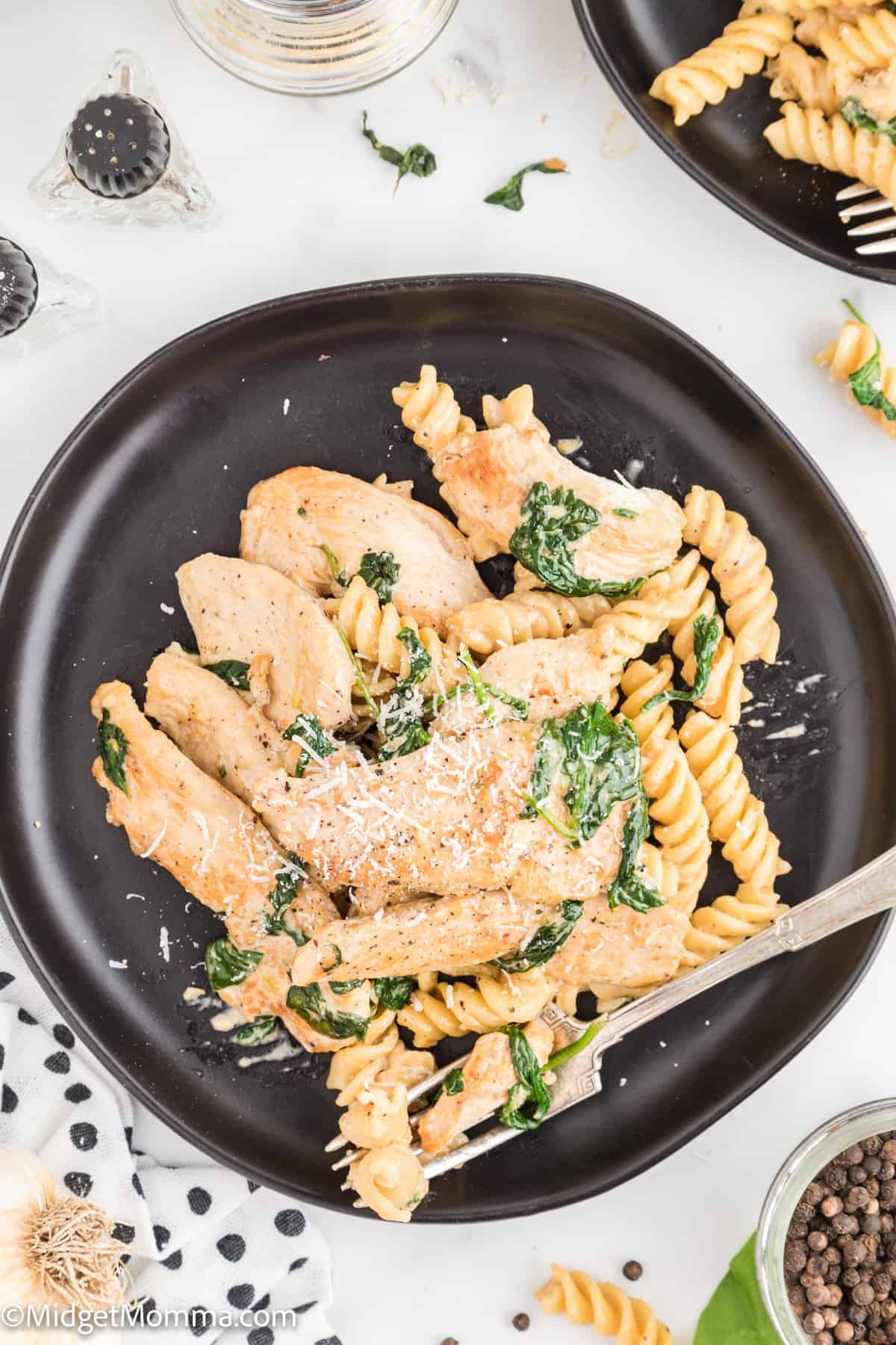 Creamy Garlic chicken pasta with spinach on a plate