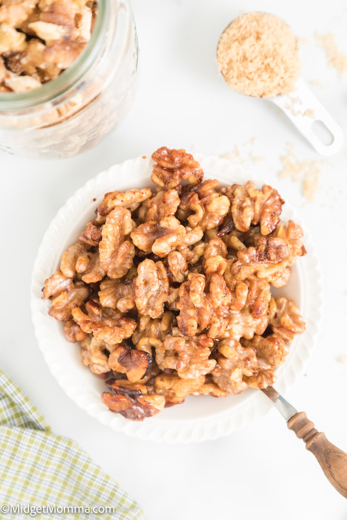 overhead photo of candied walnuts in a bowl