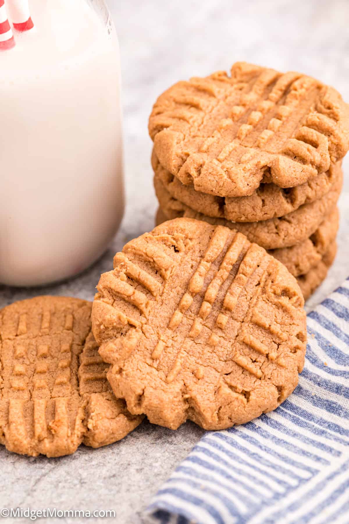 stack of Peanut Butter Cookies with a glass of milk