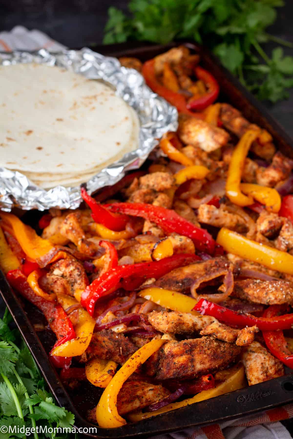 side view of Sheet pan chicken Fajitas on a sheet pan