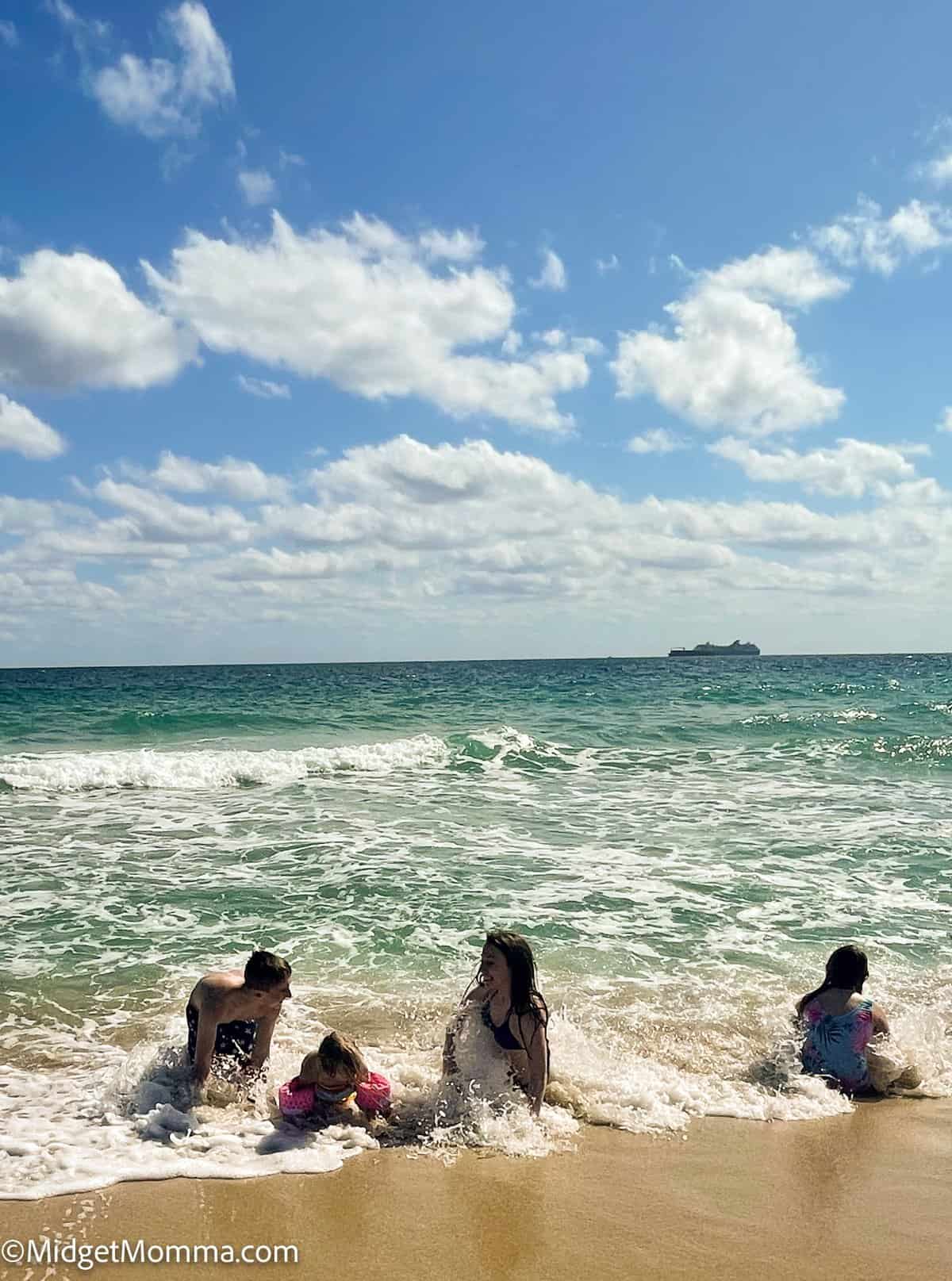 kids swimming at fort lauderdale beach