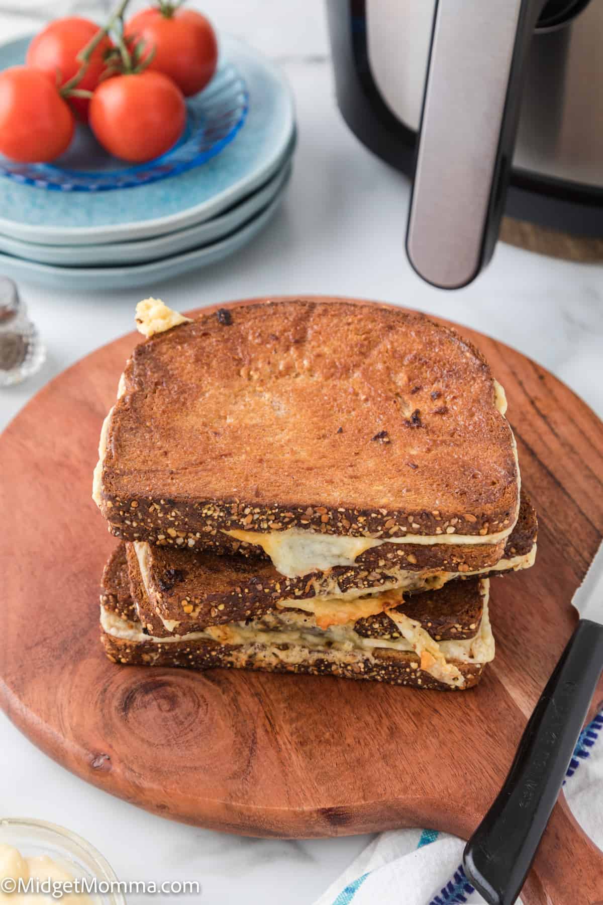 overhead photo of stack of Air Fryer Grilled Cheese Sandwich on a plate