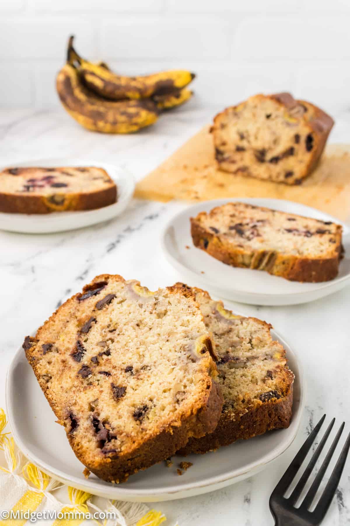 slices of Chocolate Cherry Banana Bread on a plate