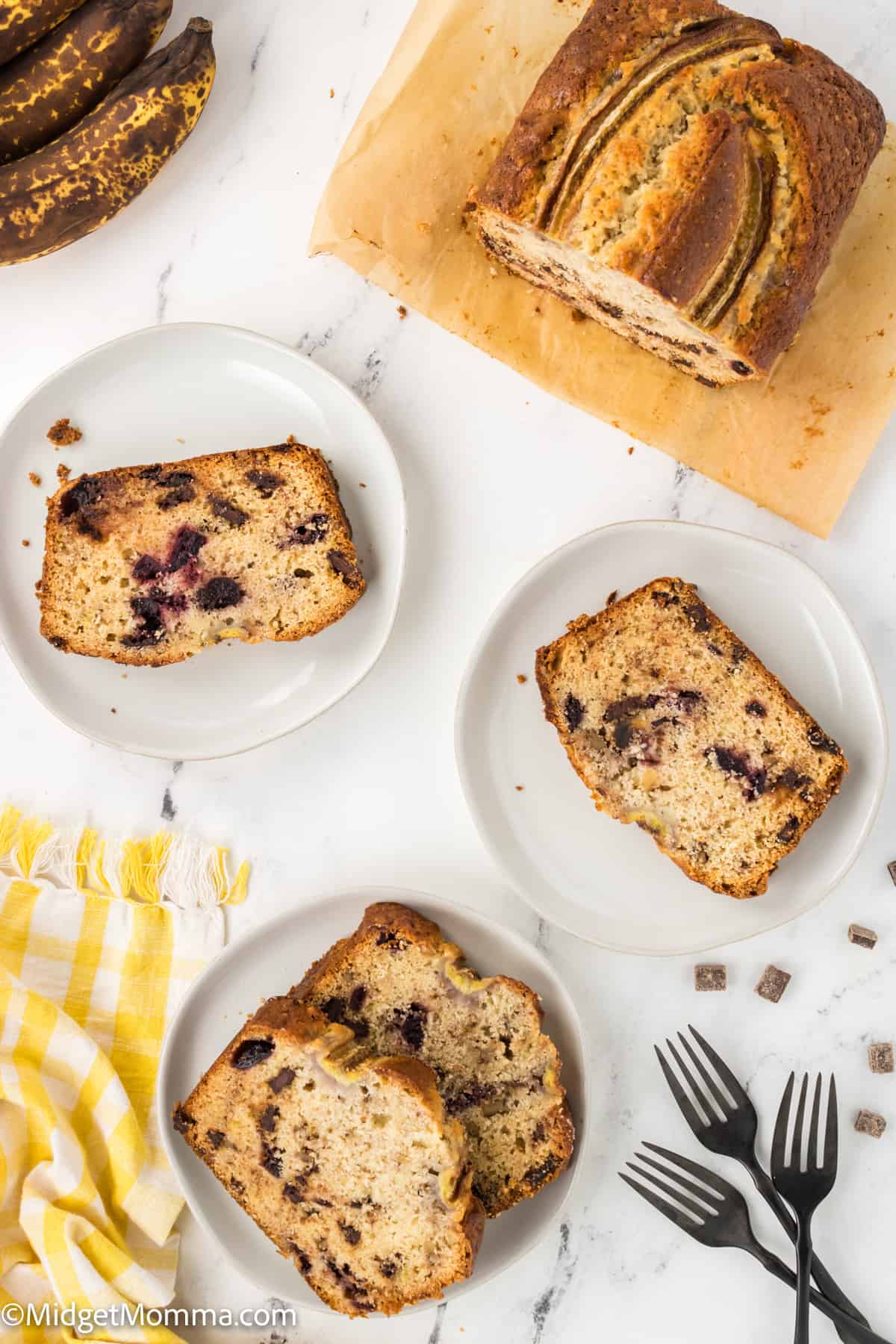 3 plates with slices of Chocolate Cherry Banana Bread