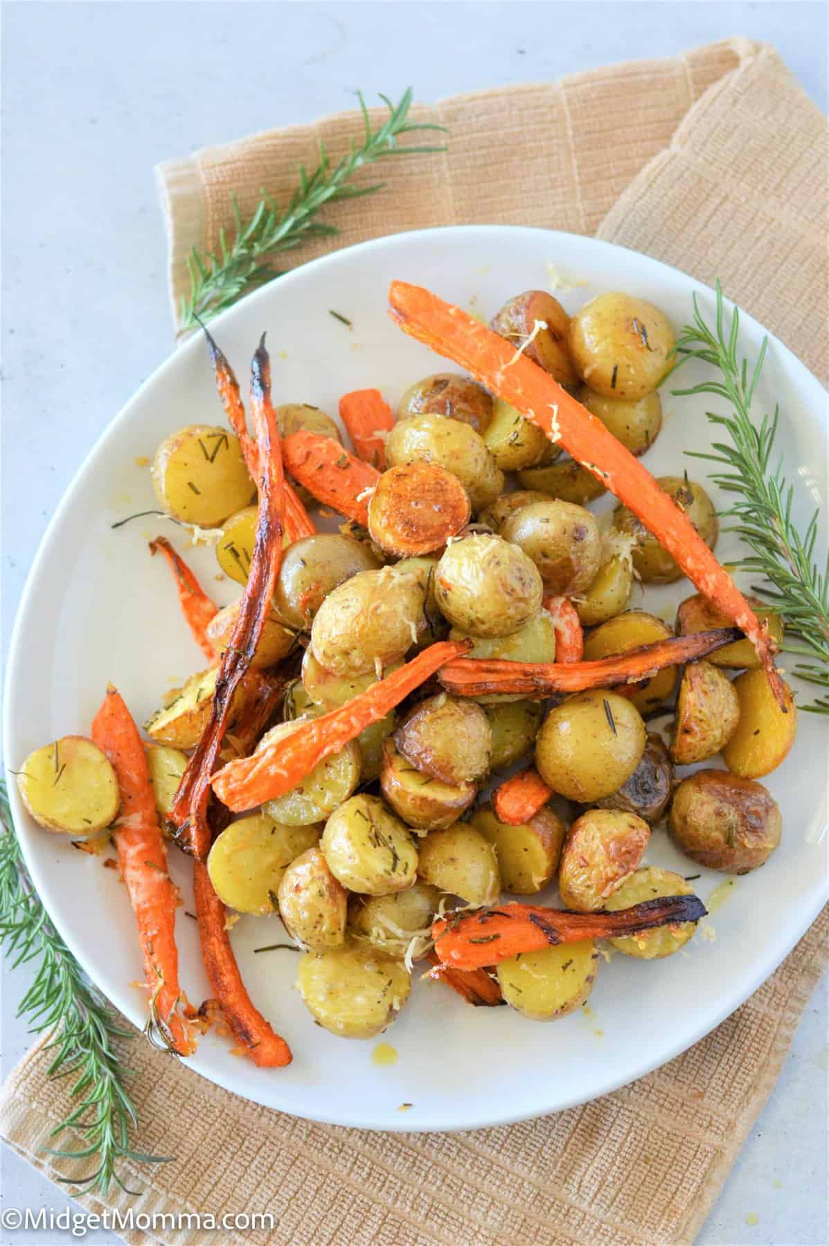 Rosemary Parmesan Roasted Carrots and Potatoes on a serving platter