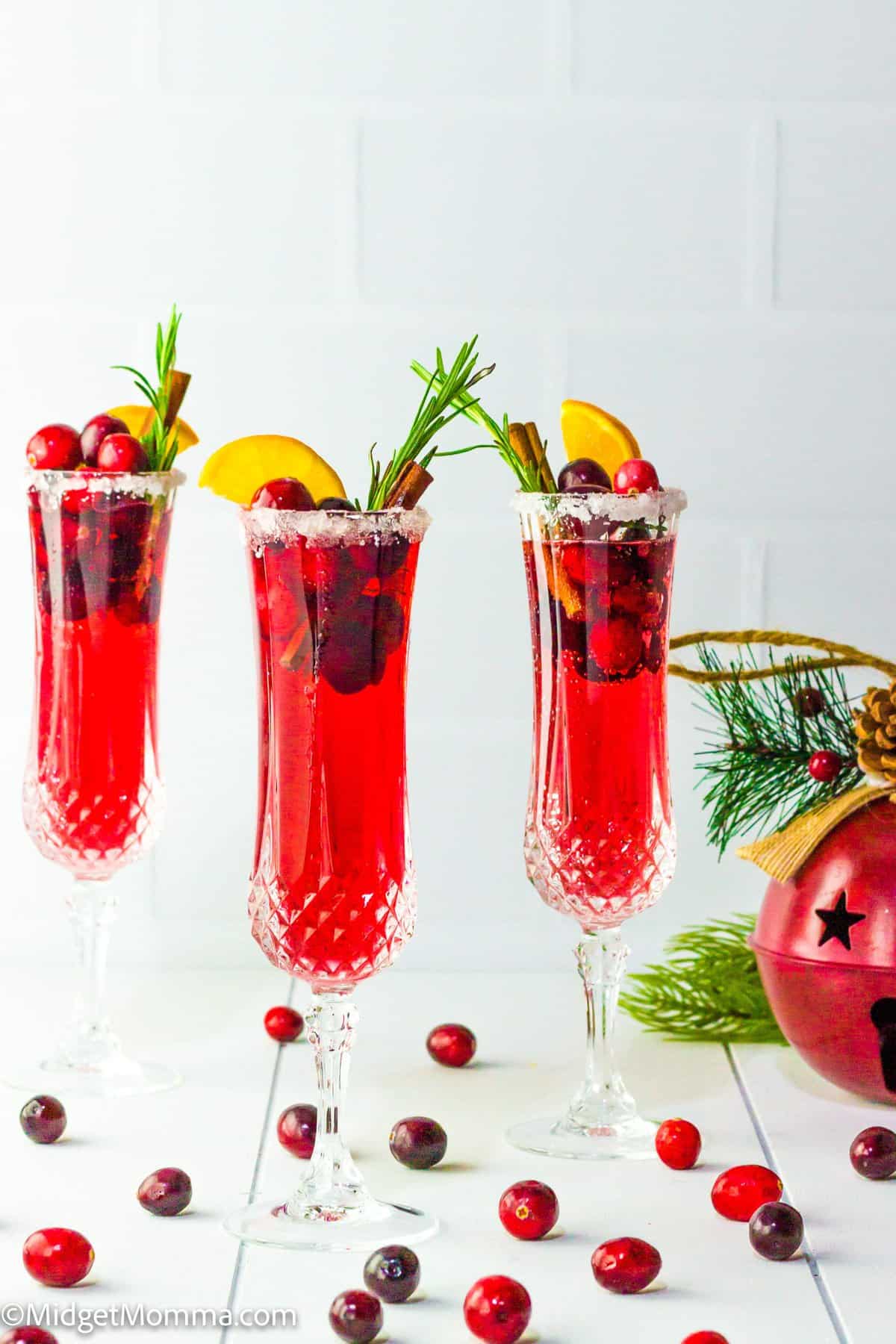 3 Cranberry mimosa cocktails in glsses
