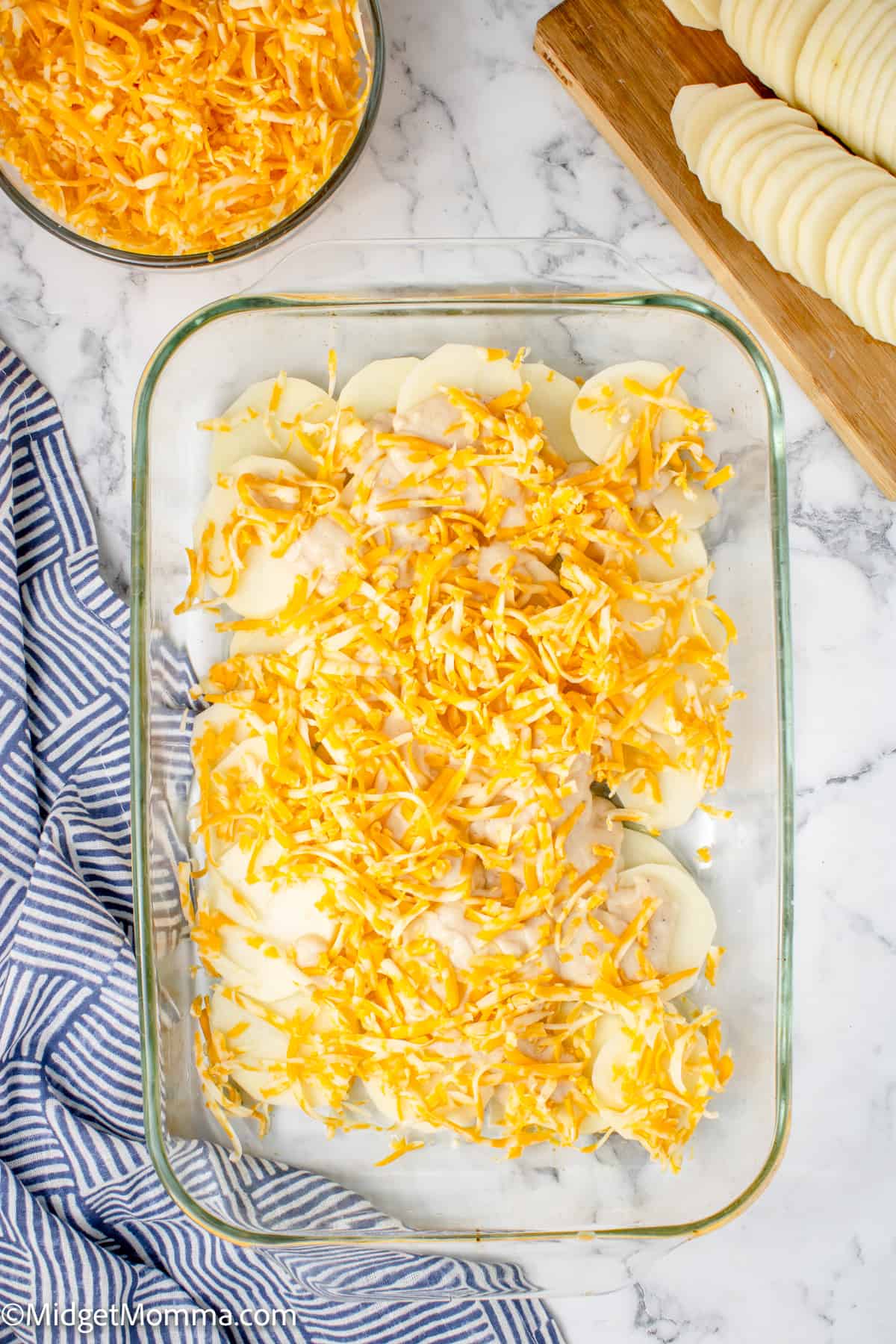 Creamy Scalloped Potatoes with Cheese • MidgetMomma