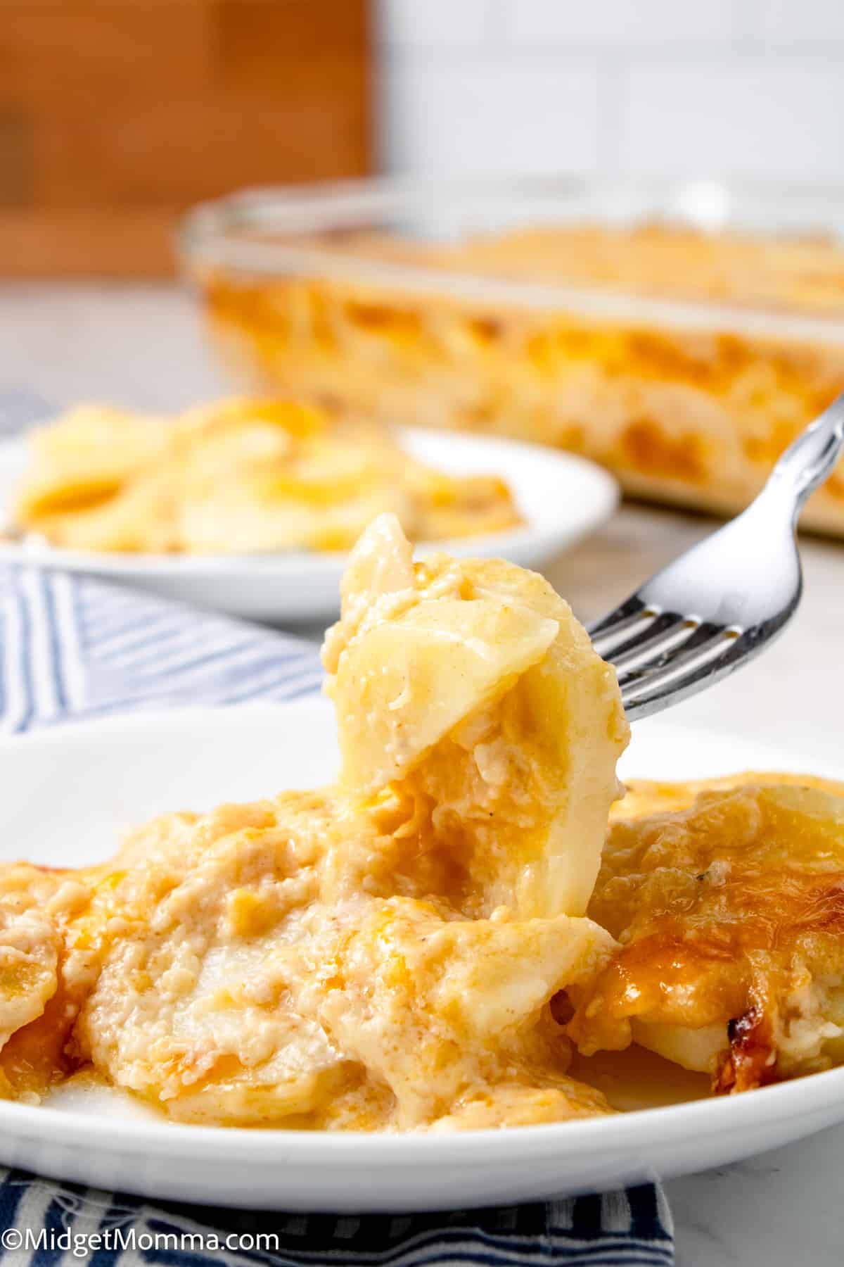 forkfull of Creamy Scalloped Potatoes with Cheese
