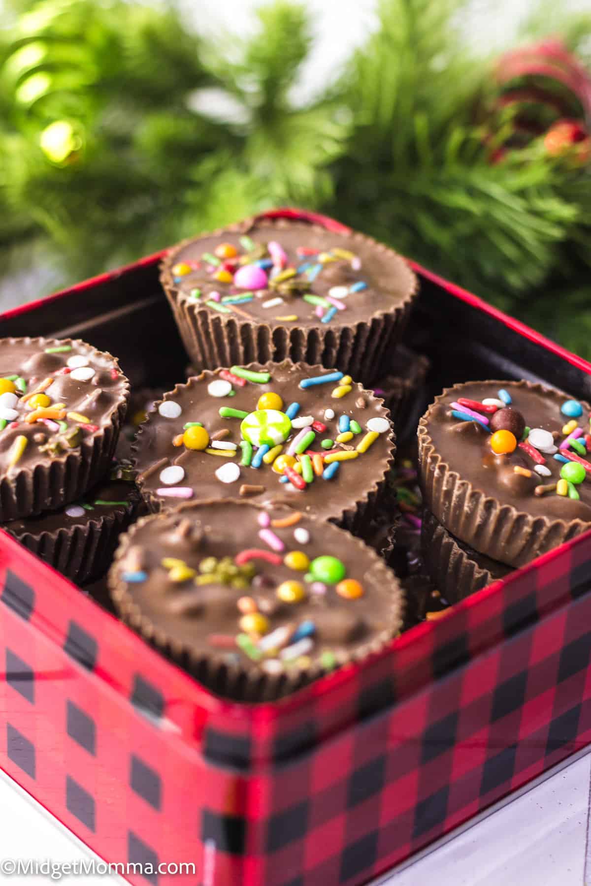 close up photo of Crockpot Christmas Candy in a christmas tin