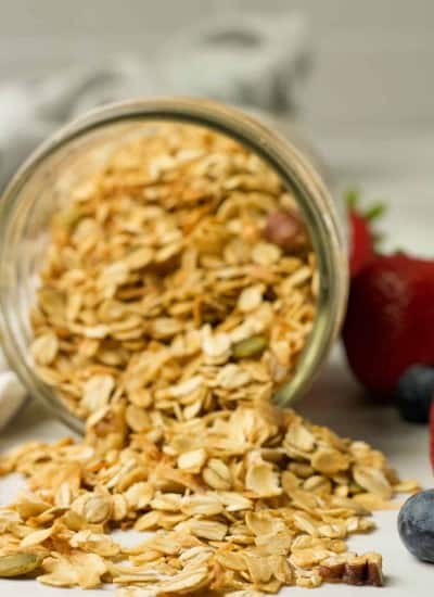 close up photo of a mason jar filled with homemade granola recipe