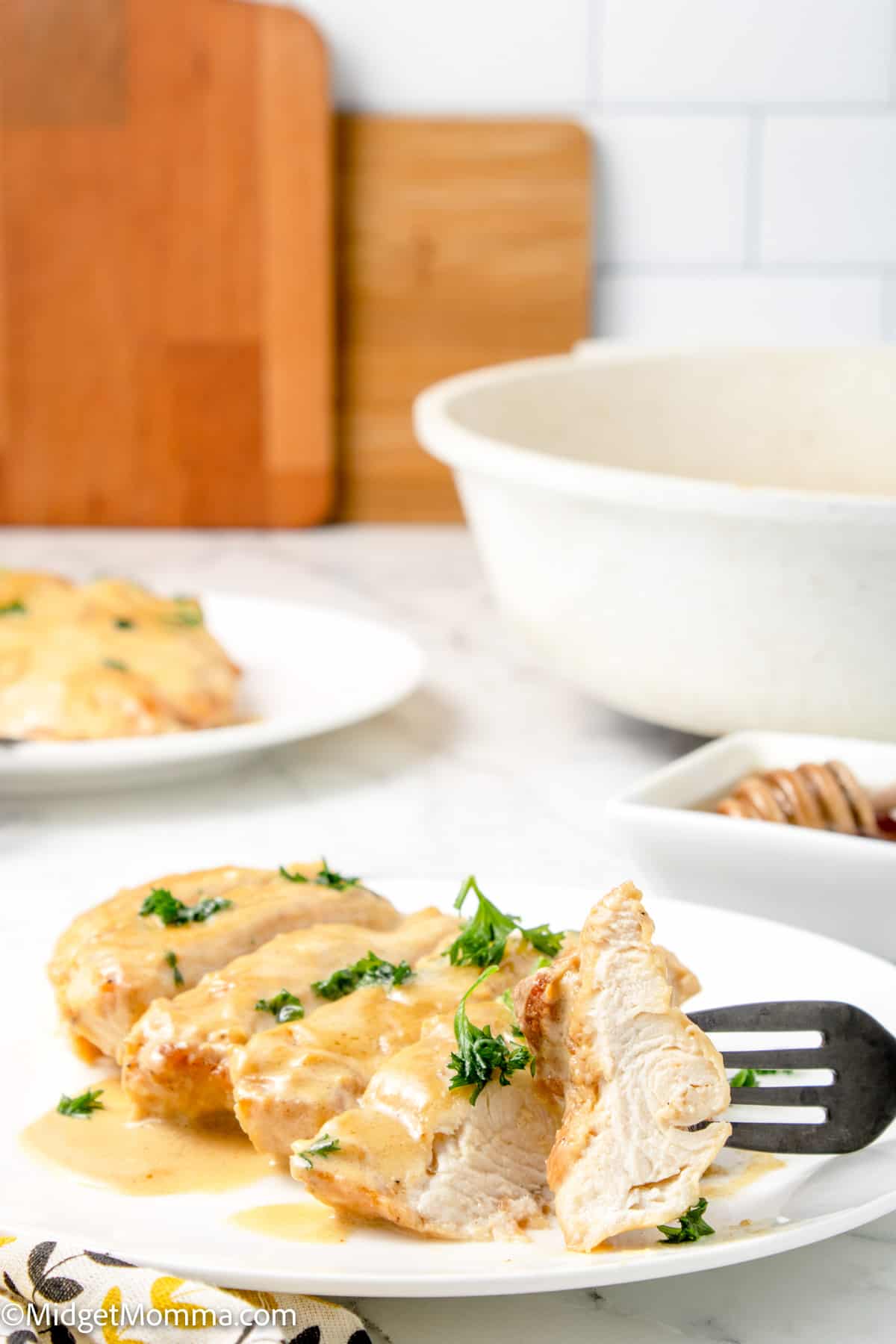 Honey Mustard Chicken cut into slices on a plate