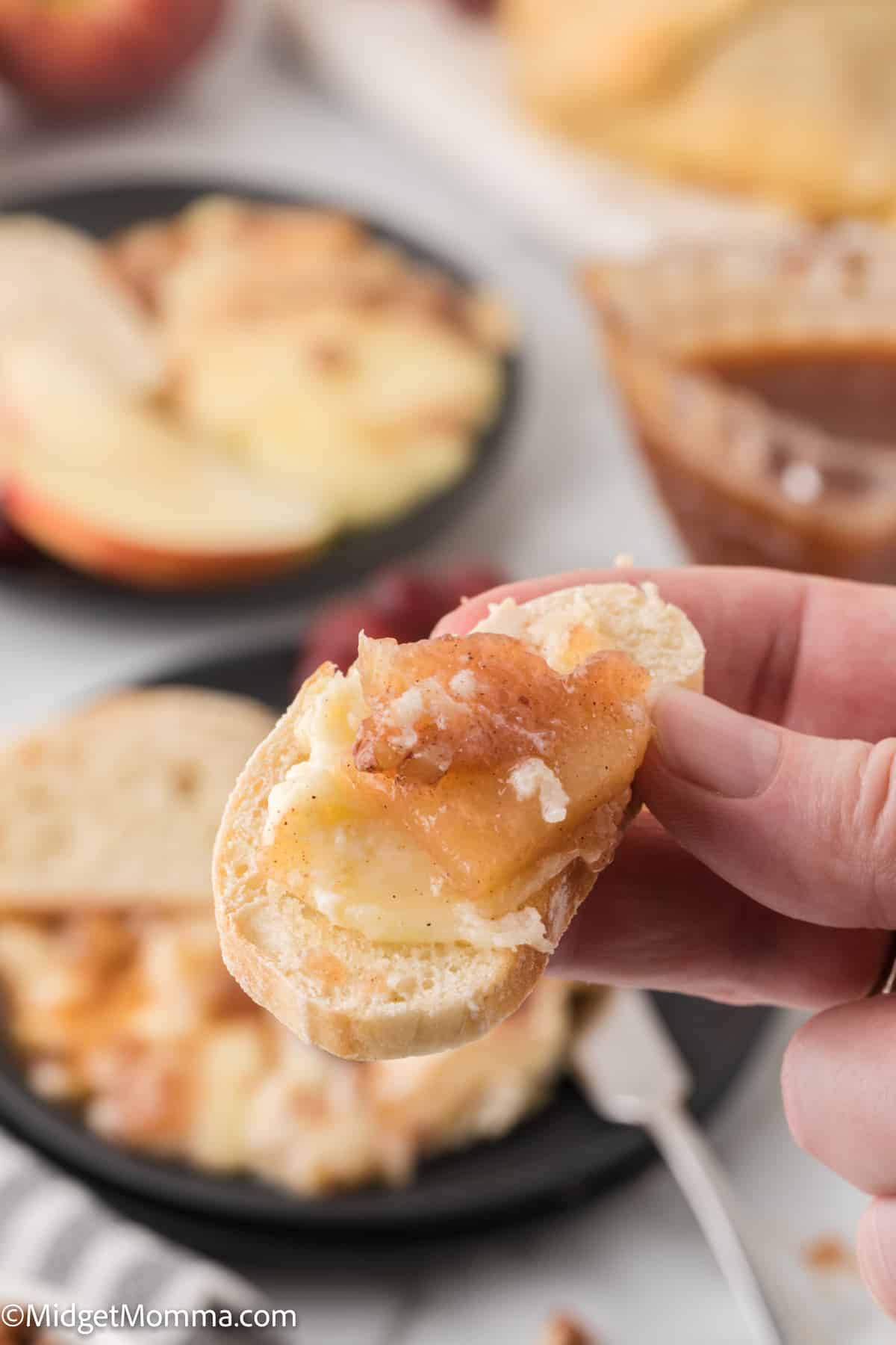 Puff Pastry Baked Brie with Apples on slices of bread