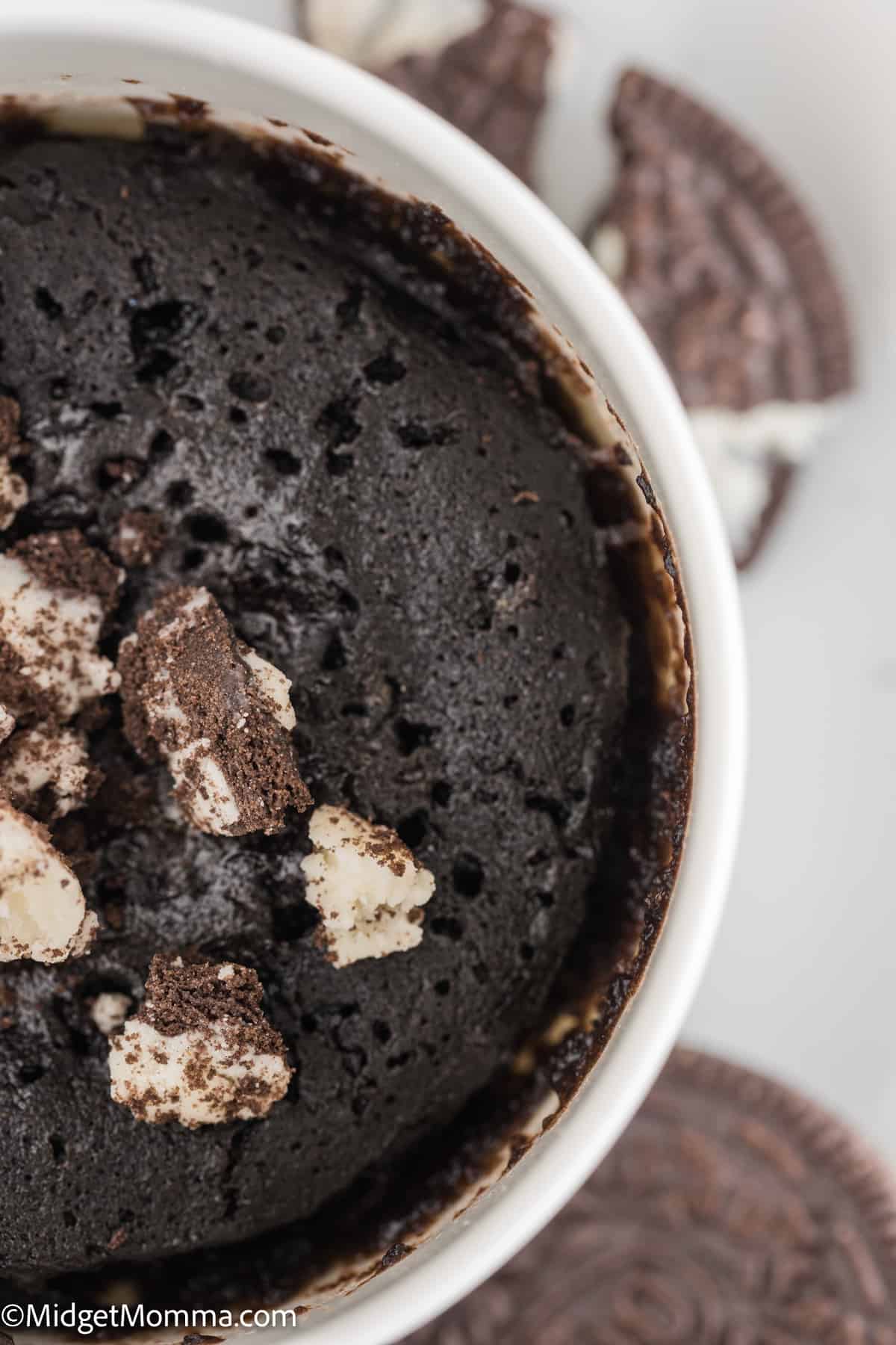 Microwave Oreo Mug Cake topped with crushed Oreo Cookies