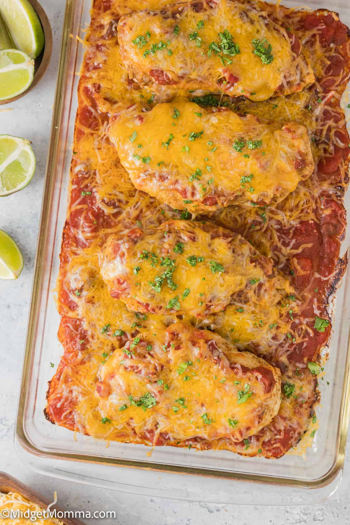 overhead photo of Cheesy Baked Salsa Chicken Recipe in a casserole dish