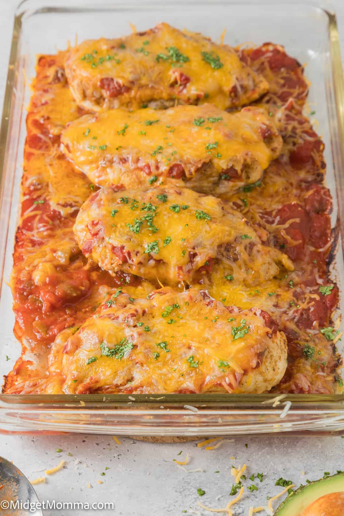 baking dish with cooked salsa chicken in it 