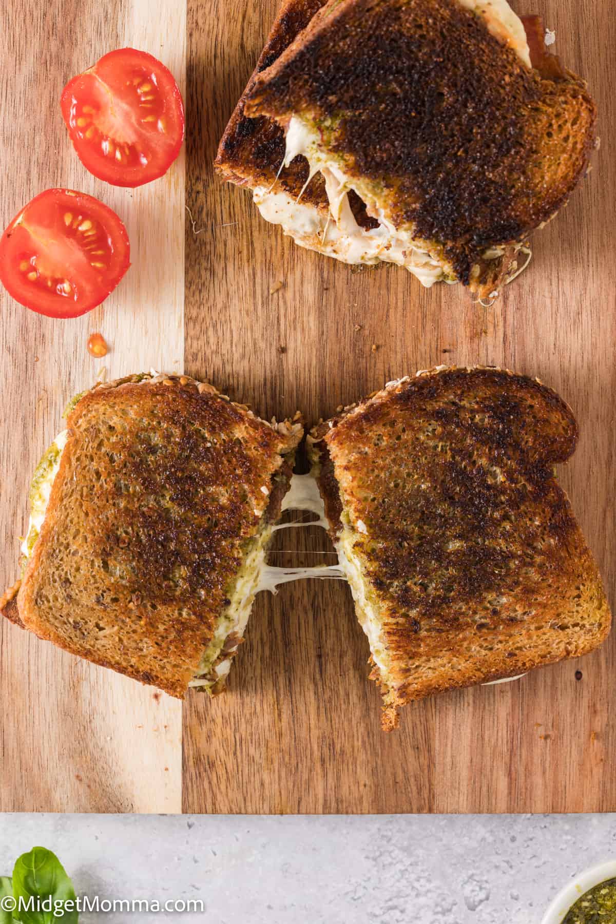 overhead photo of Pesto Grilled Cheese Sandwich Recipe with Mozzarella Cheese, Tomato & Bacon