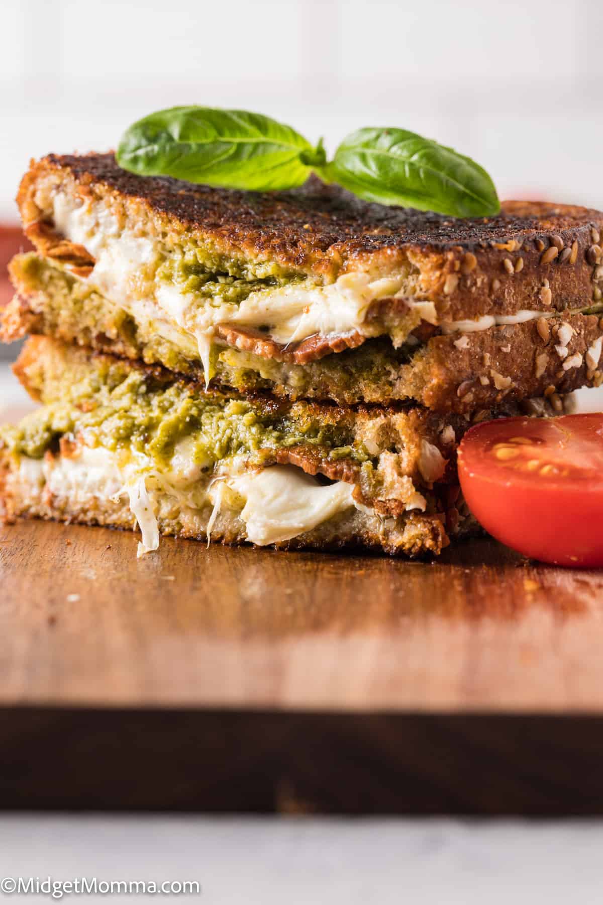 Pesto Grilled Cheese Sandwich Recipe with Mozzarella Cheese, Tomato & Bacon on a plate