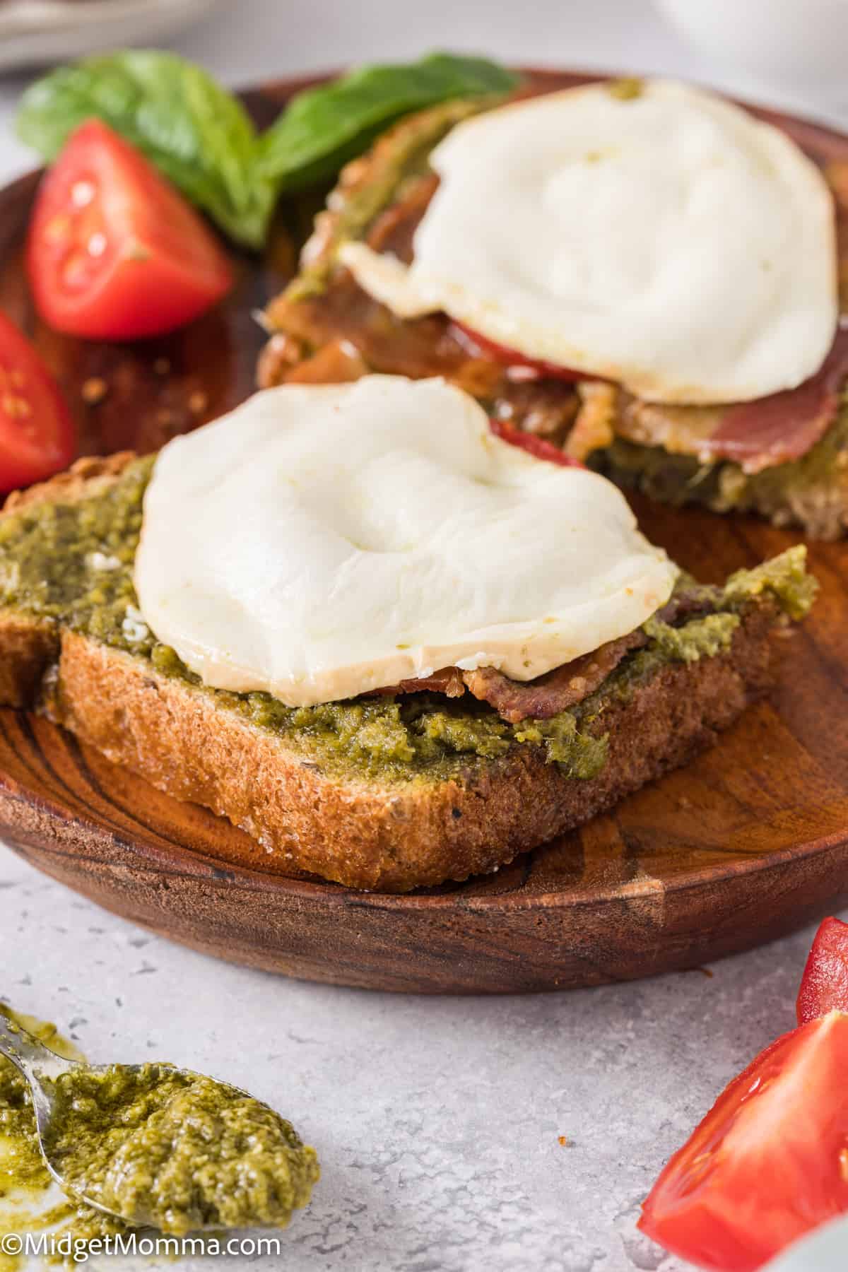 close up photo of an open faced Pesto Grilled Cheese Sandwich Recipe with Mozzarella Cheese, Tomato & Bacon