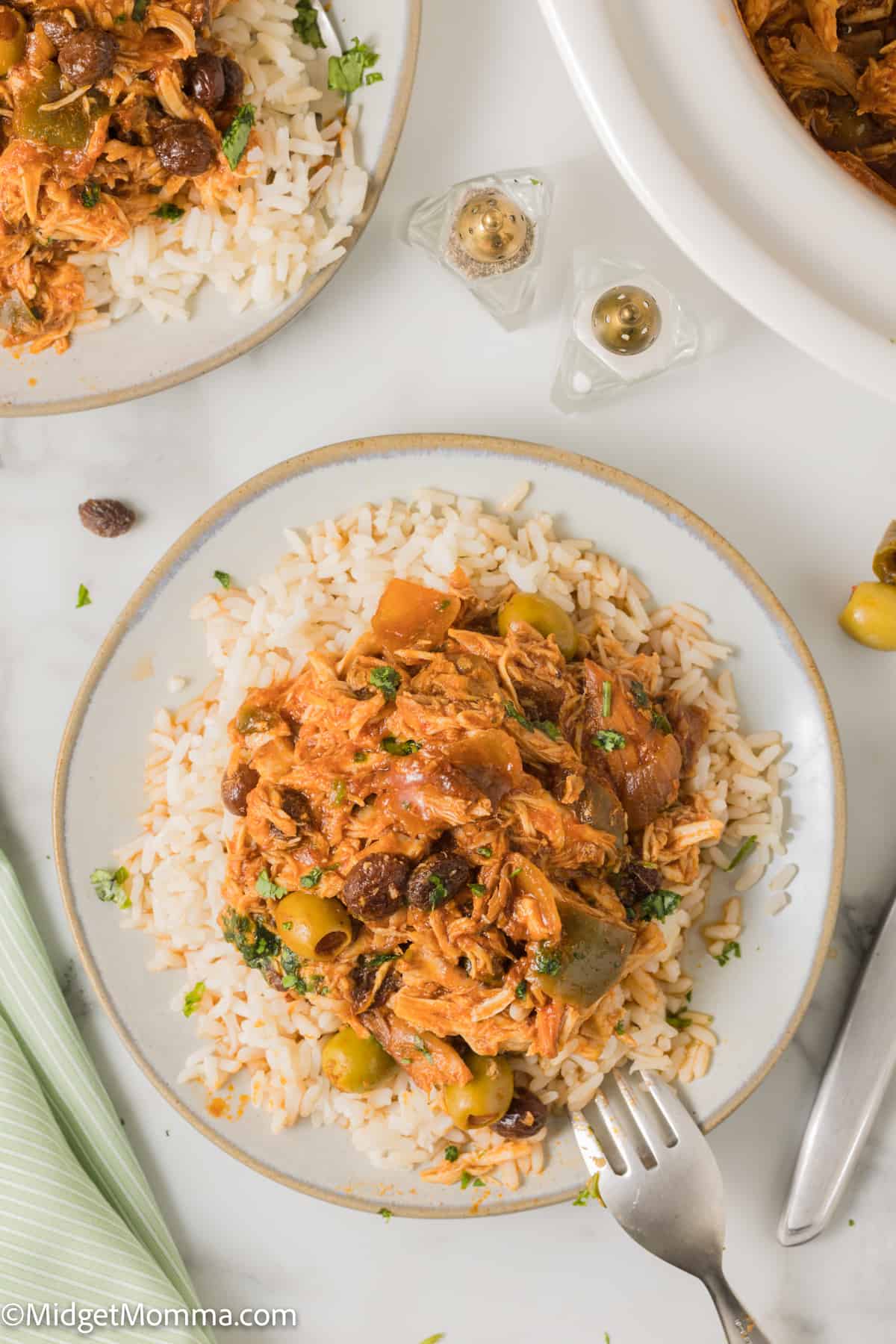 overhead photo of Slow Cooker Cuban Style Chicken Fricassee served over rice