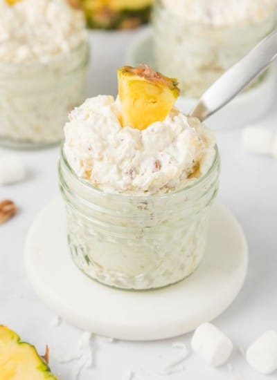 single mason jar filled with pineapple fluff