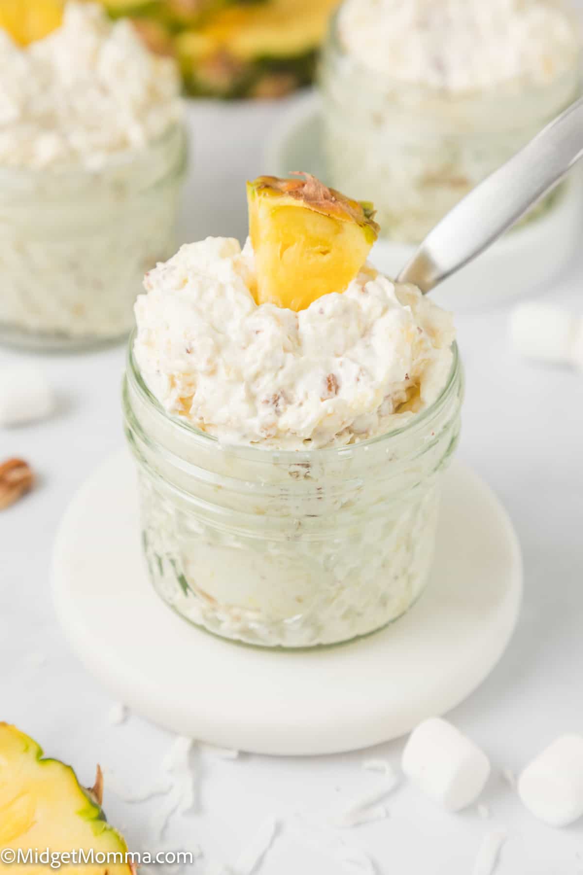 single mason jar filled with pineapple fluff