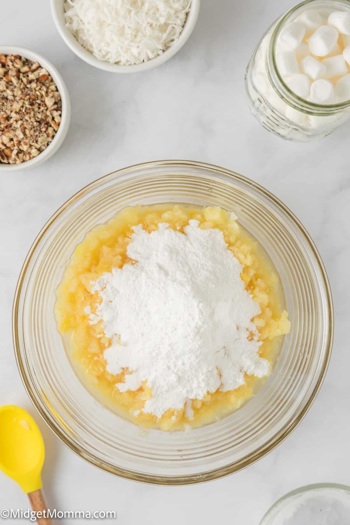 pudding mix and canned pineapple in a mixing bowl