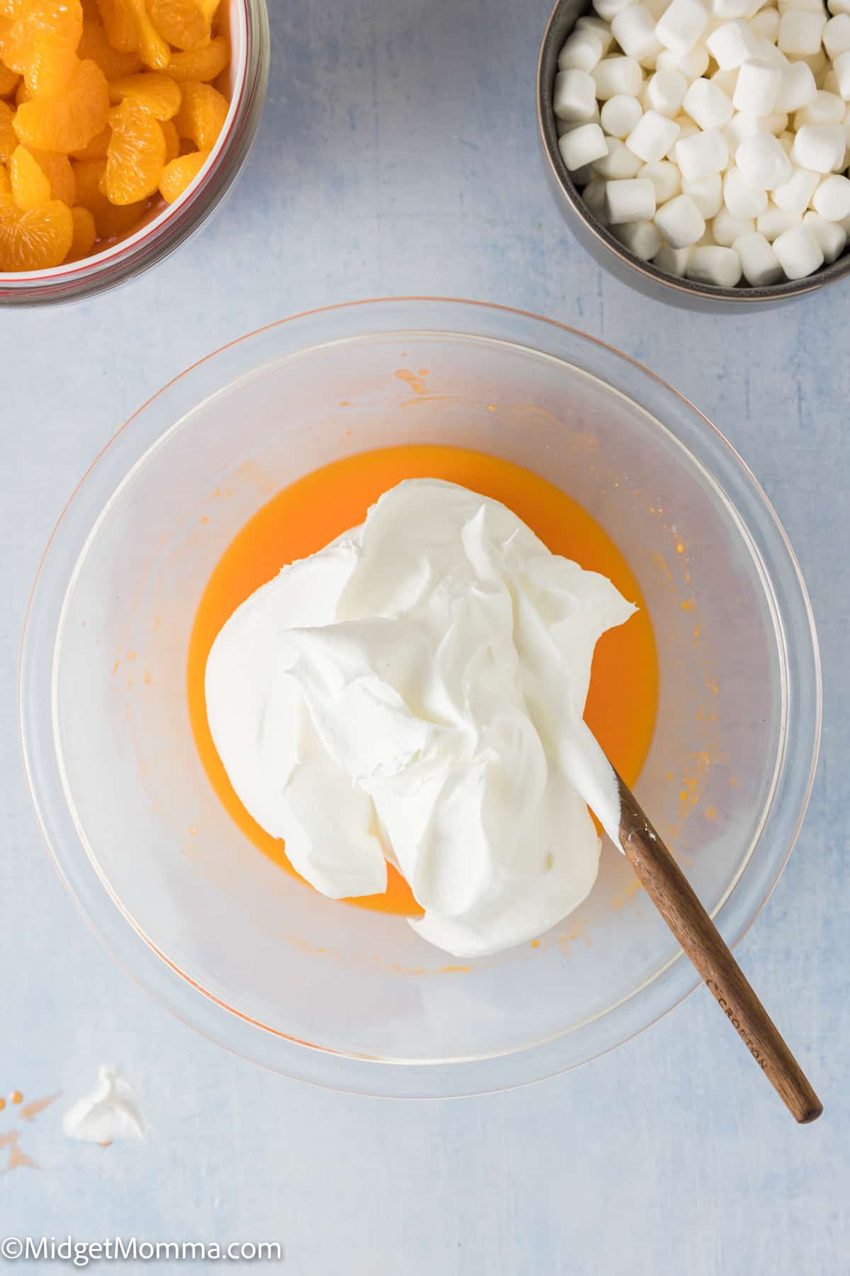 cool whip added into the orange jello salad mixture