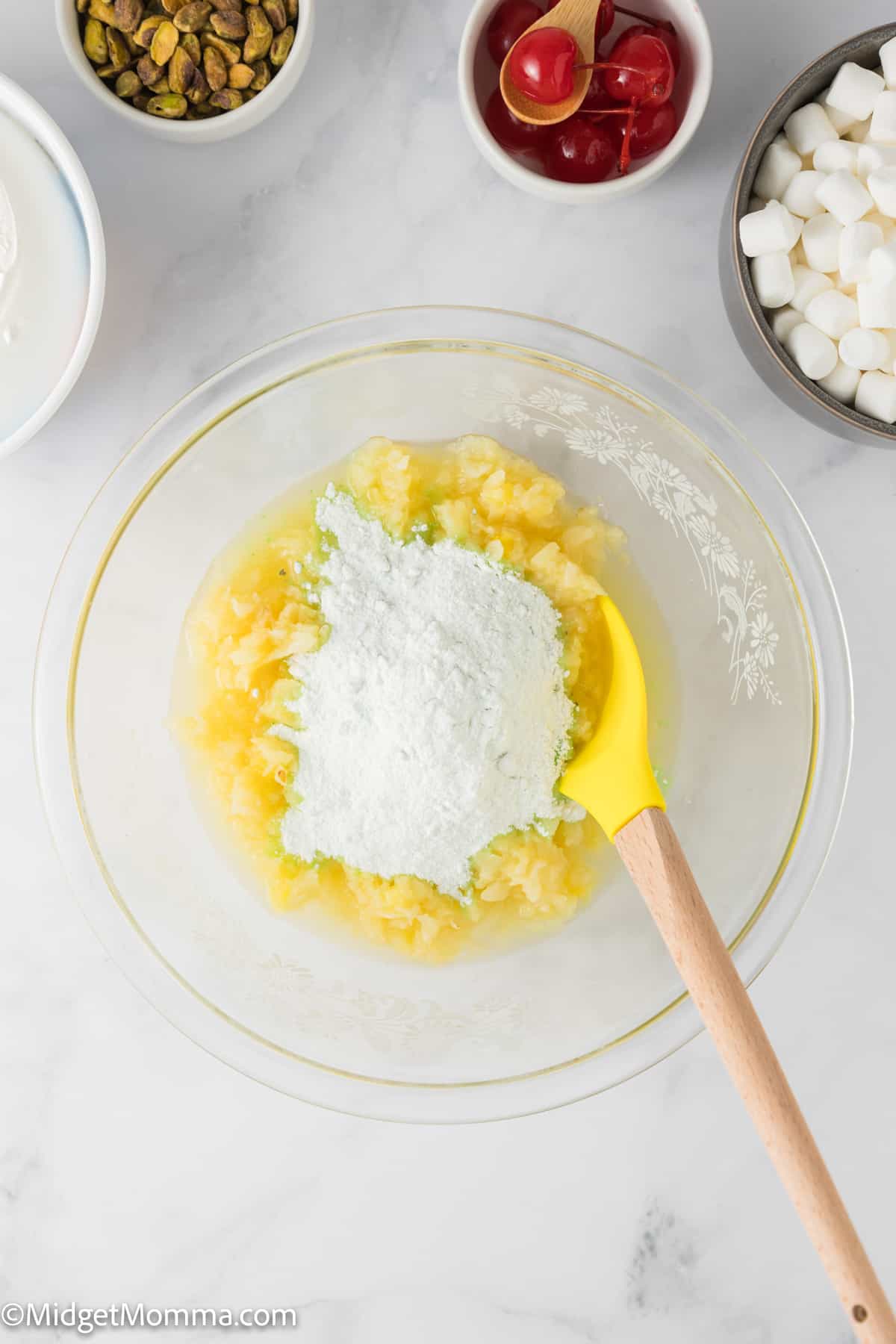 pistachio pudding and pineapple in a bowl