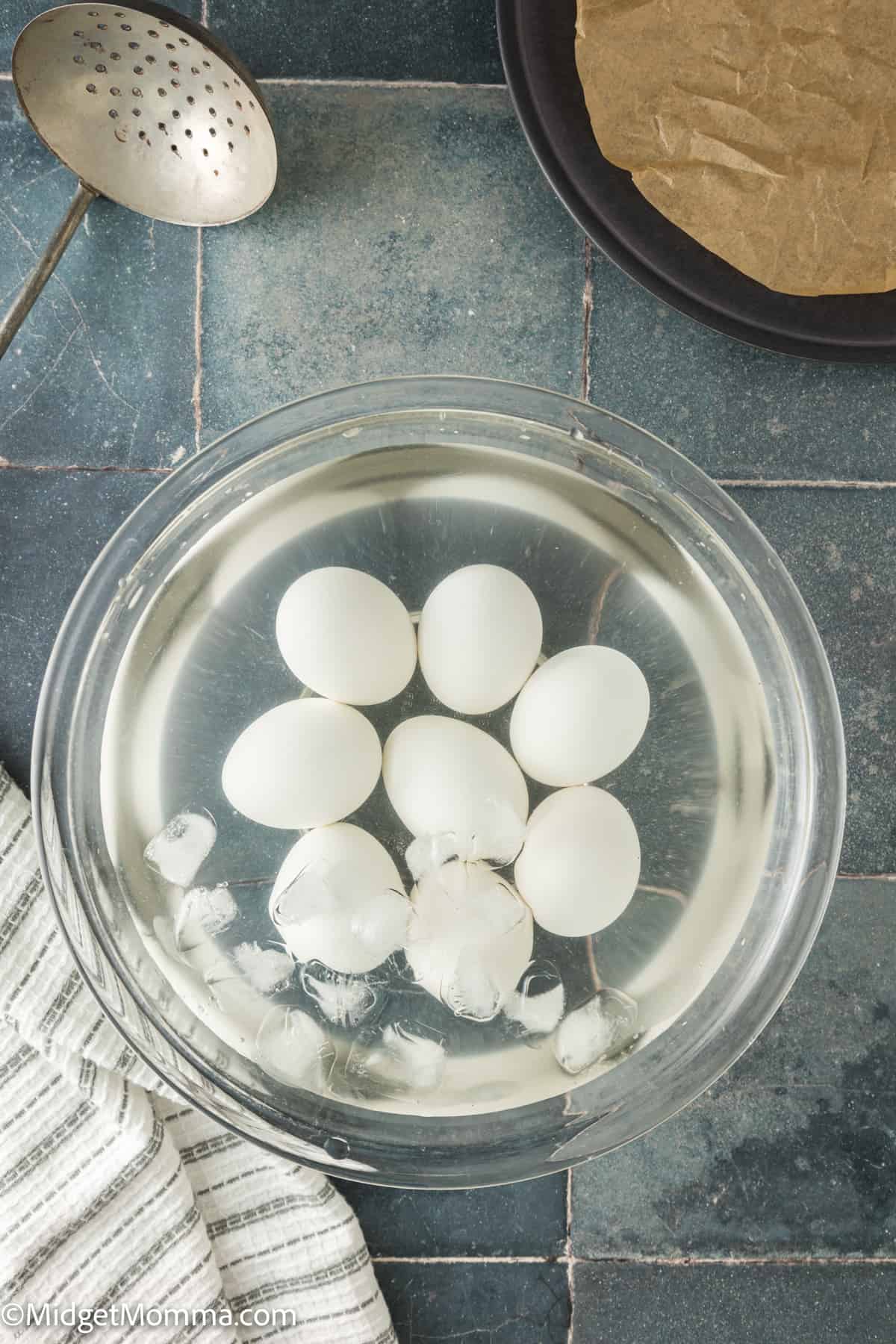 Cooked jammy eggs in an ice bath