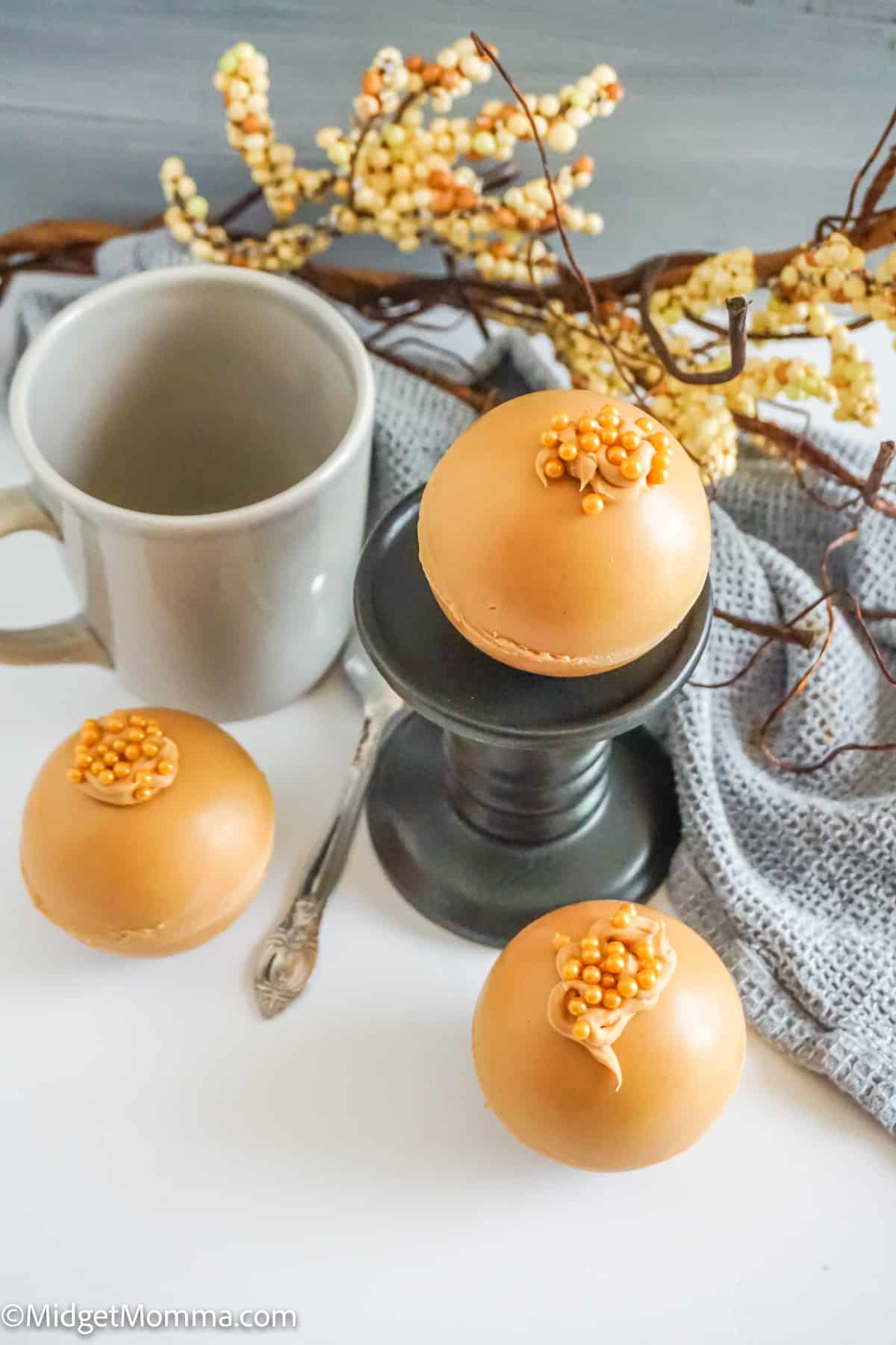 overhead photo of 3 peanut butter hot chocolate bombs