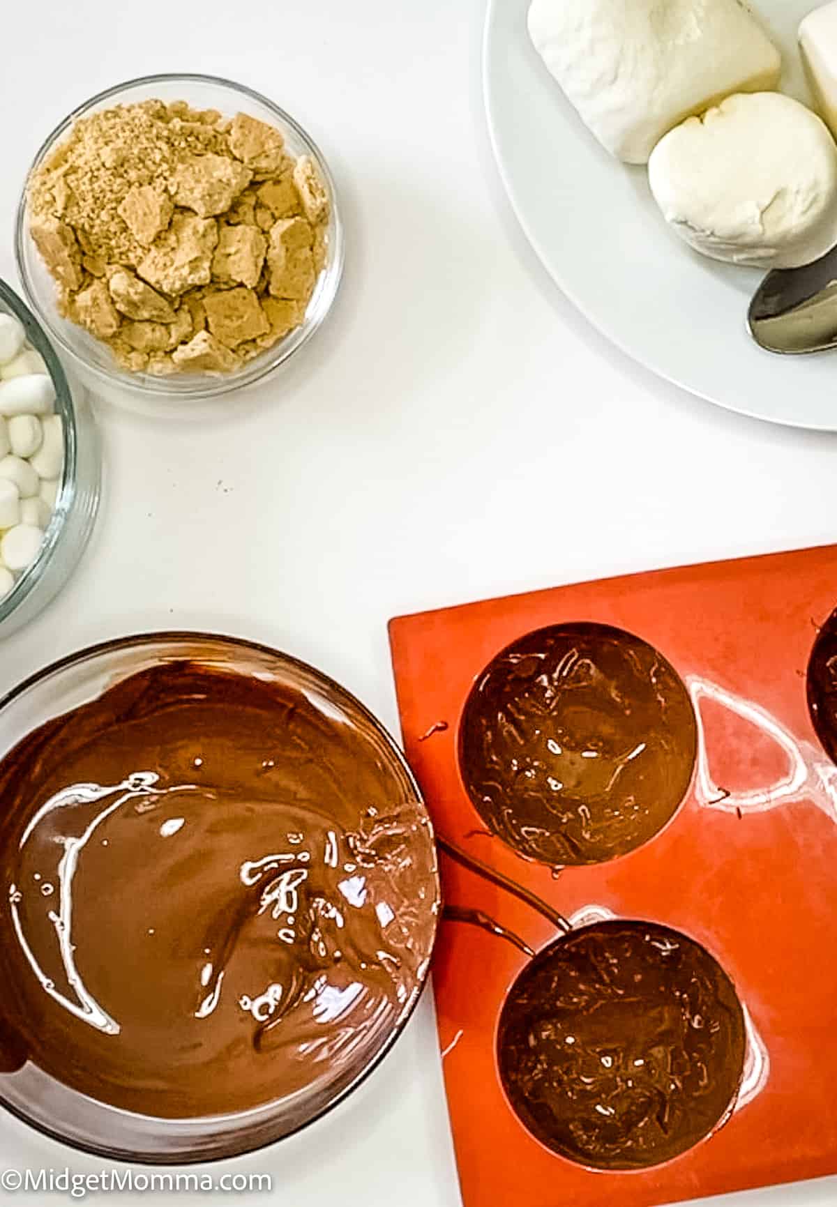 melted chocolate in a hot chocolate bomb mold