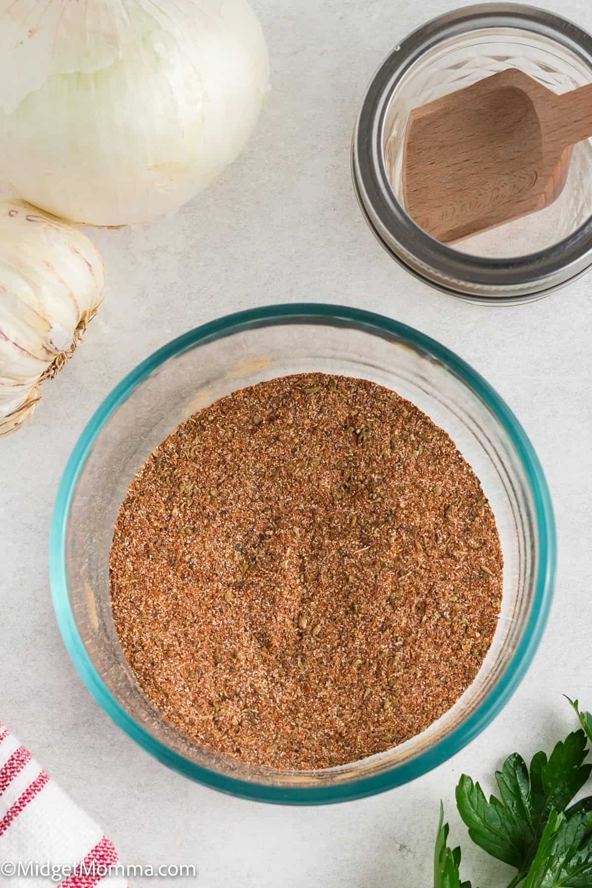 Adobo Seasoning Recipe ingredients mixed in a glass bowl.
